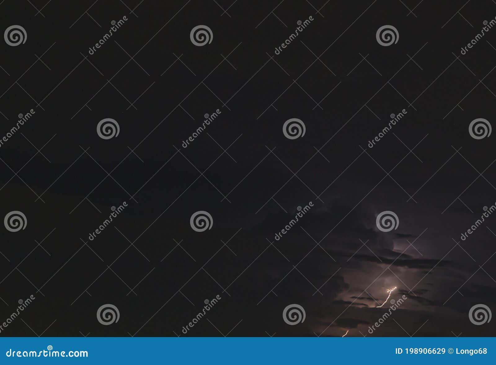 Picture of a Flash in the Night Sky with Glowing Clouds Stock Image