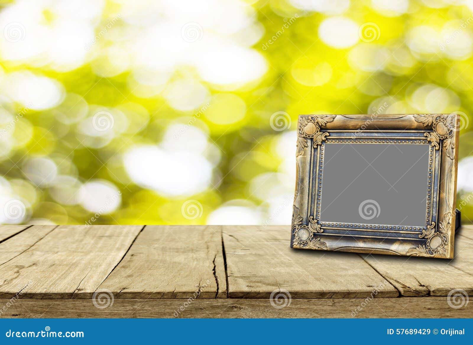 Picture Frame on Wooden Floor and Bokeh for Background Texture Stock