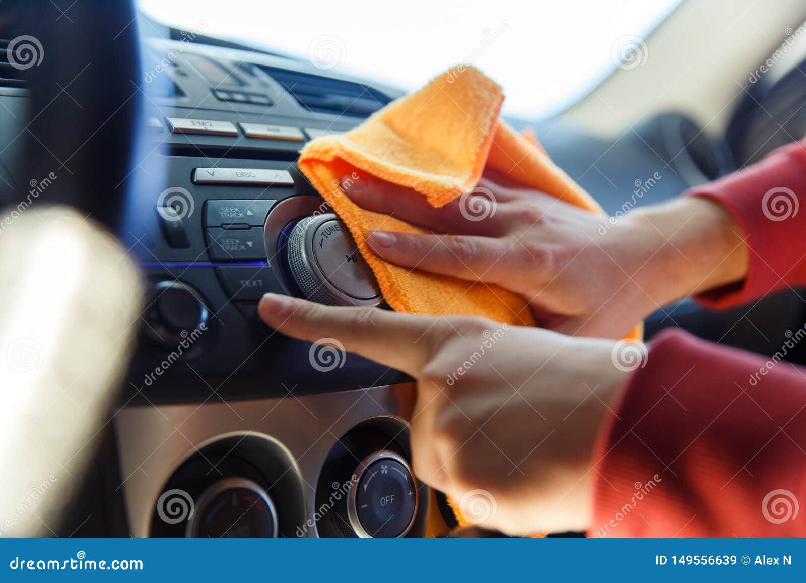Picture Of Male S Hand With Orange Rag Washing Car Interior