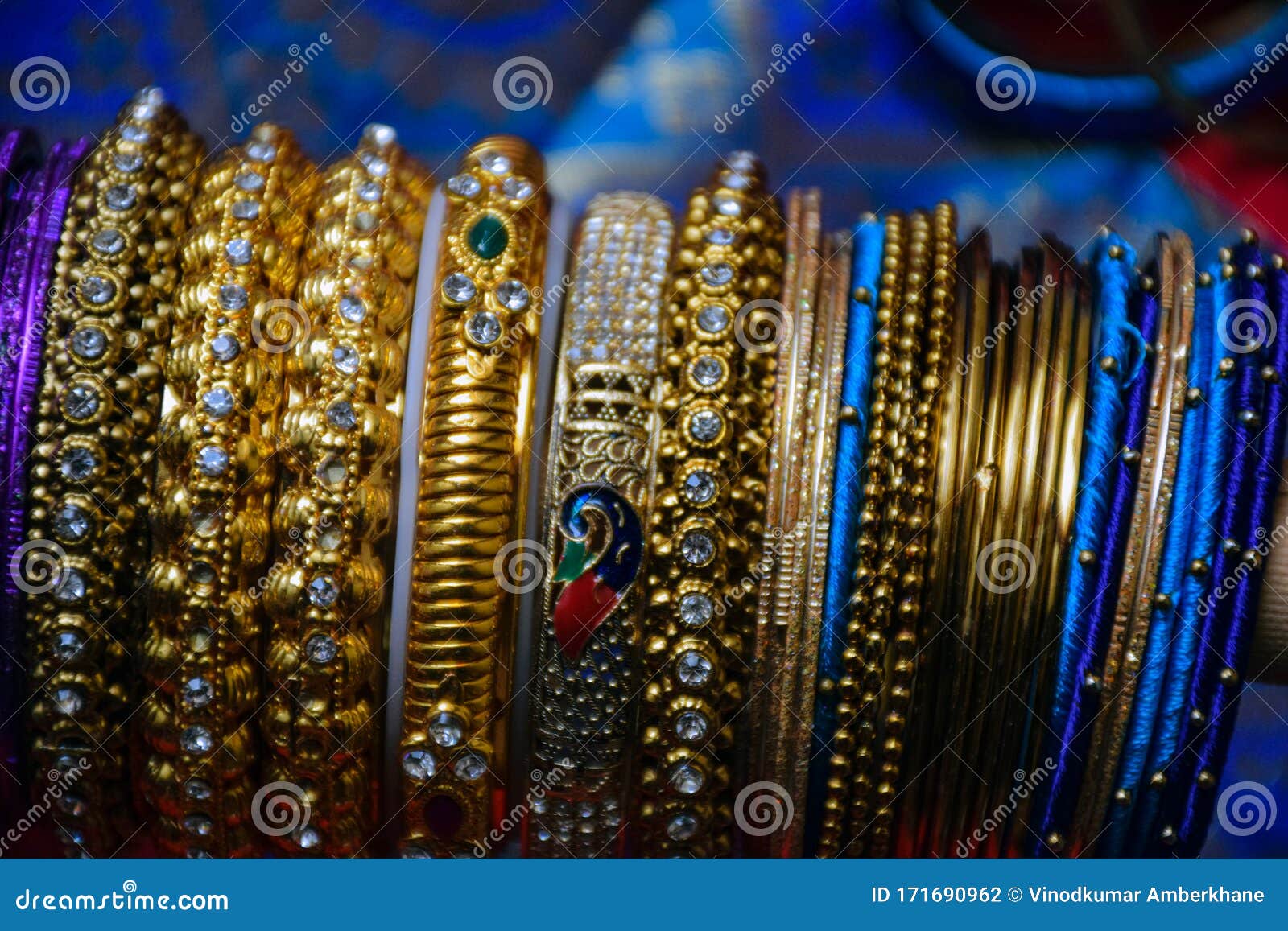 Picture of Side View of Girl Wearing Gold Bangles Stock Photo Image