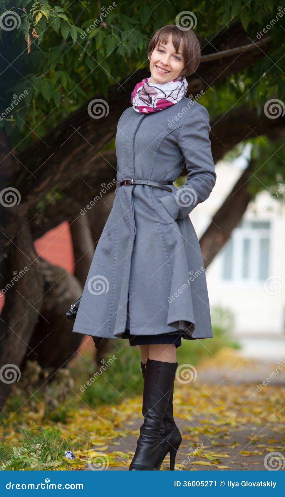 Picture of Smiling Young Woman in Grey Coat Stock Image Image of
