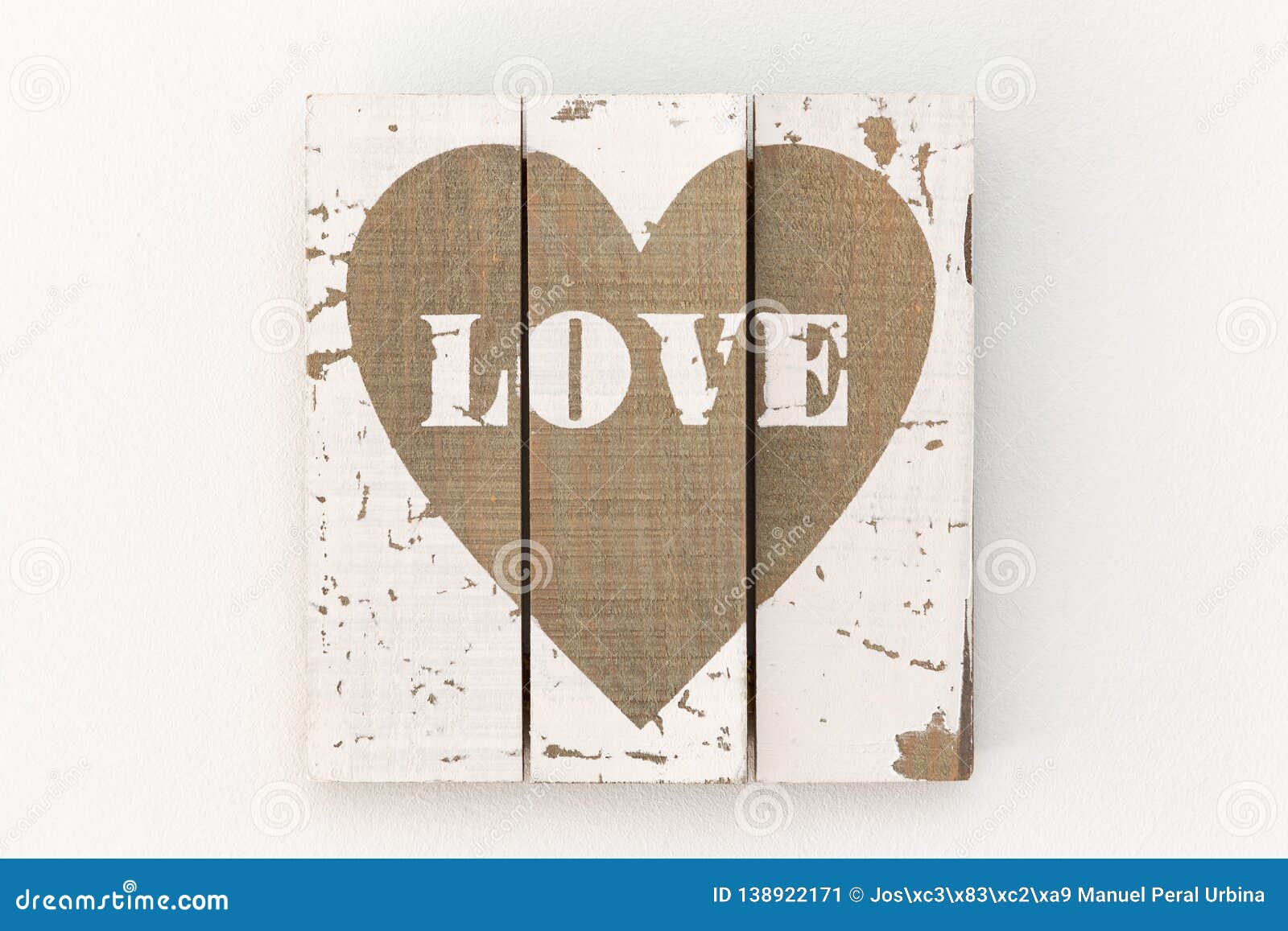 picture of white wooden boards and painted brown heart