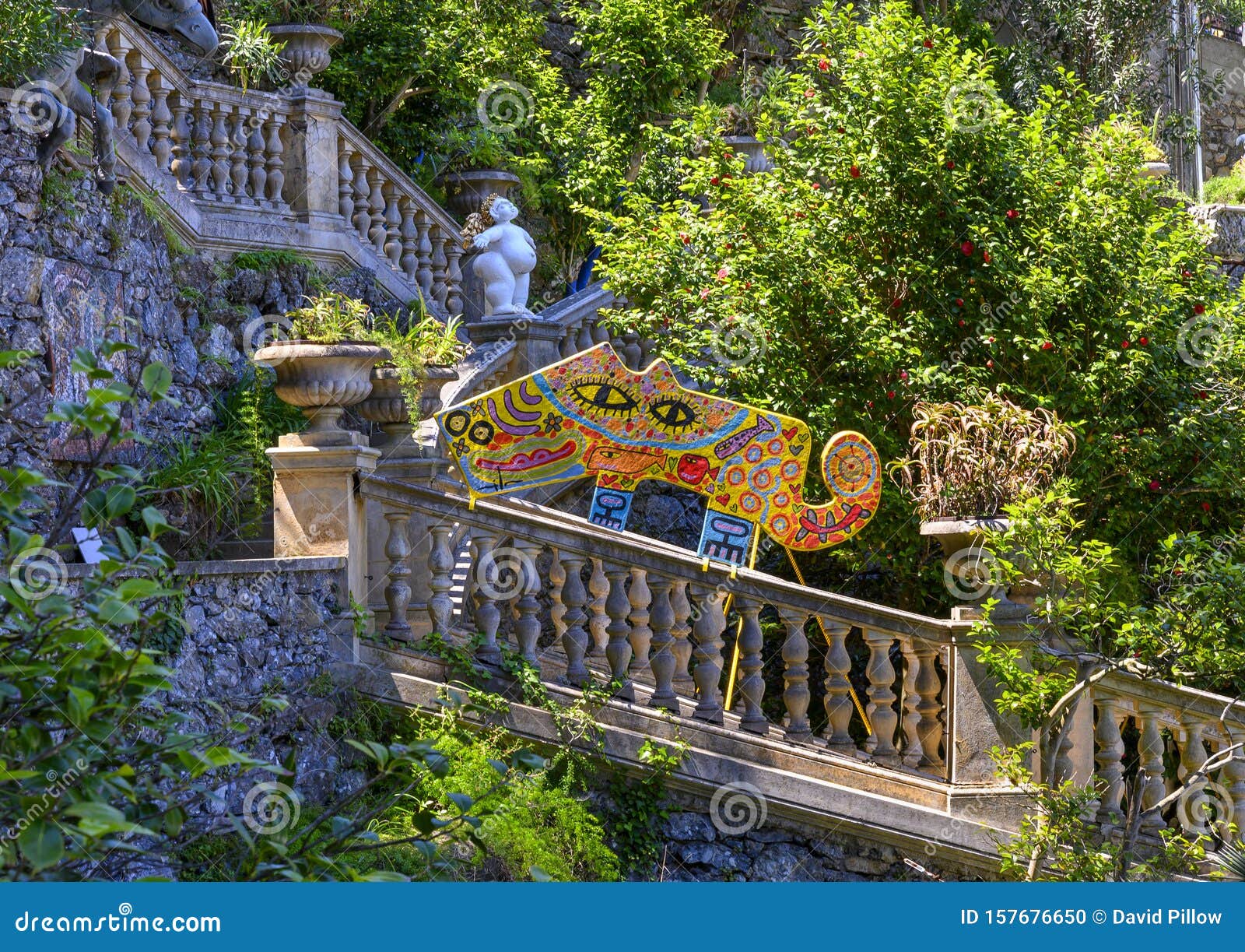 colorful whimsical cat sculpture, museo del parco in portofino, italy