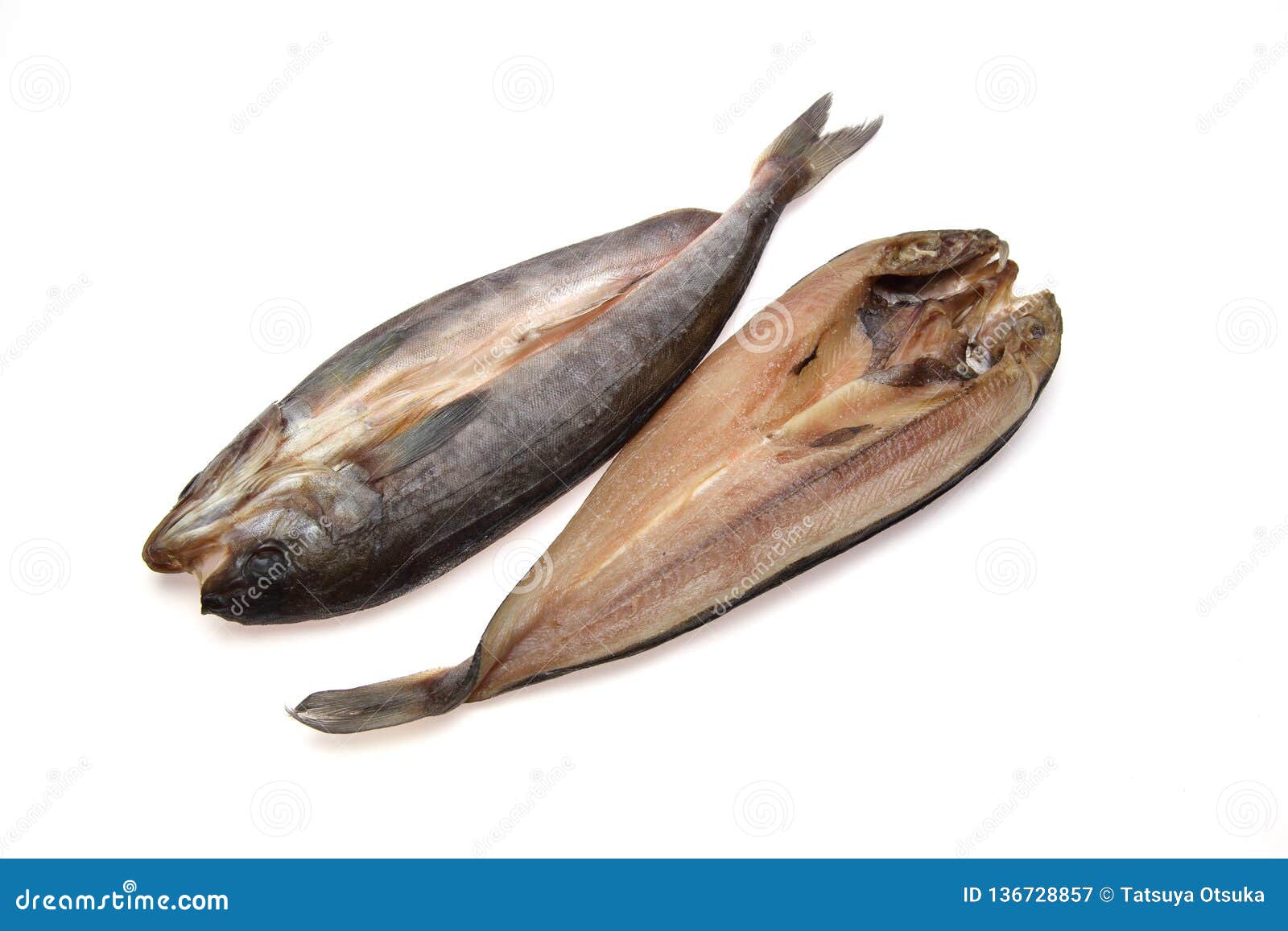 cut open and dried atka mackerel in white background