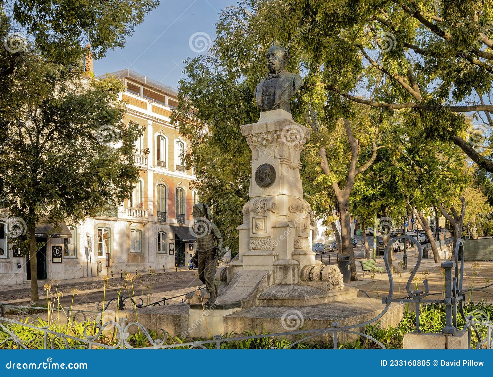 monument to eduardo coelho, founder of the popular newspaer diario de noticias in 1864, located in lisbon, portugal.