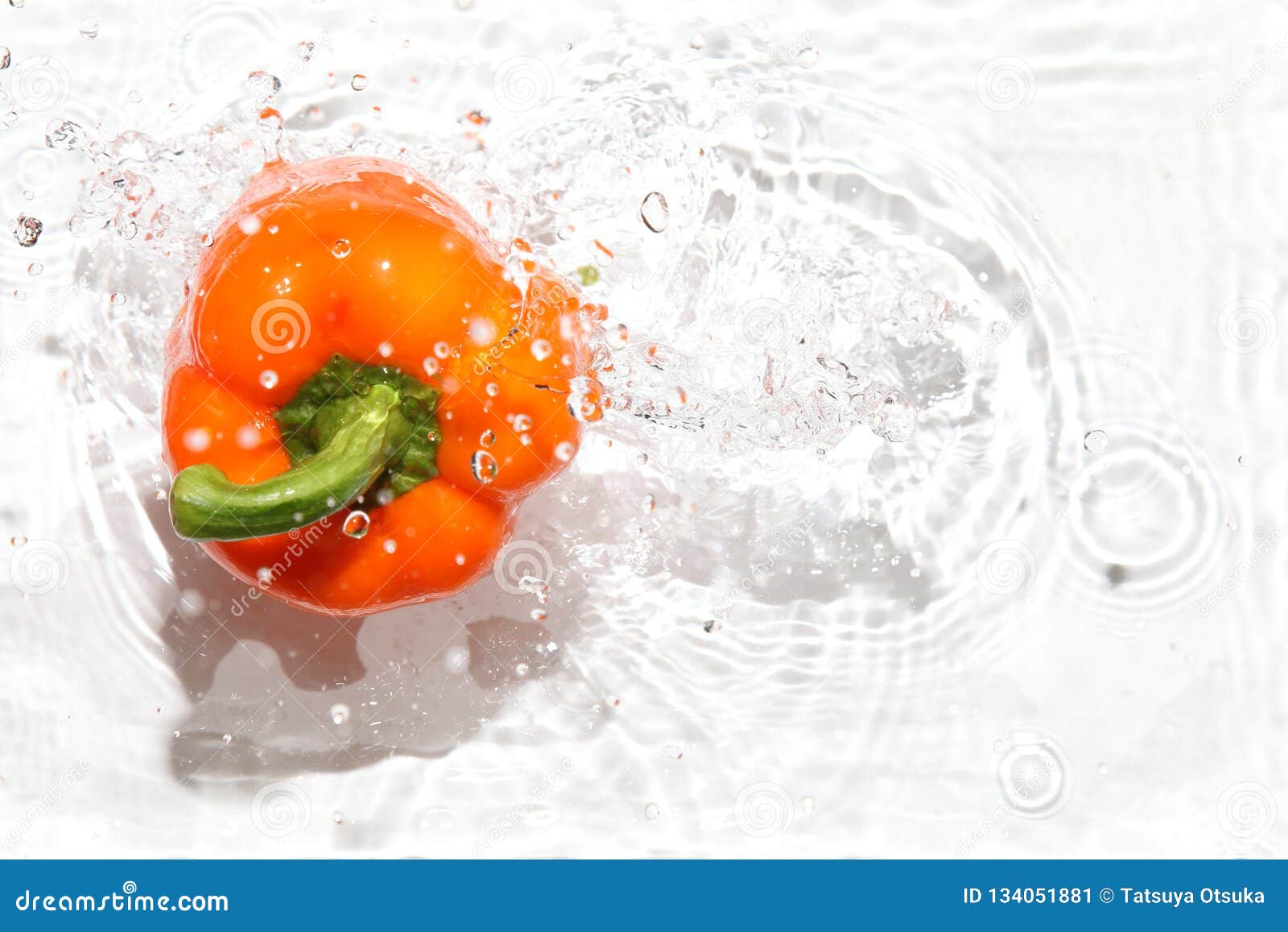 Paprikas into the water stock image. Image of orange 134051881