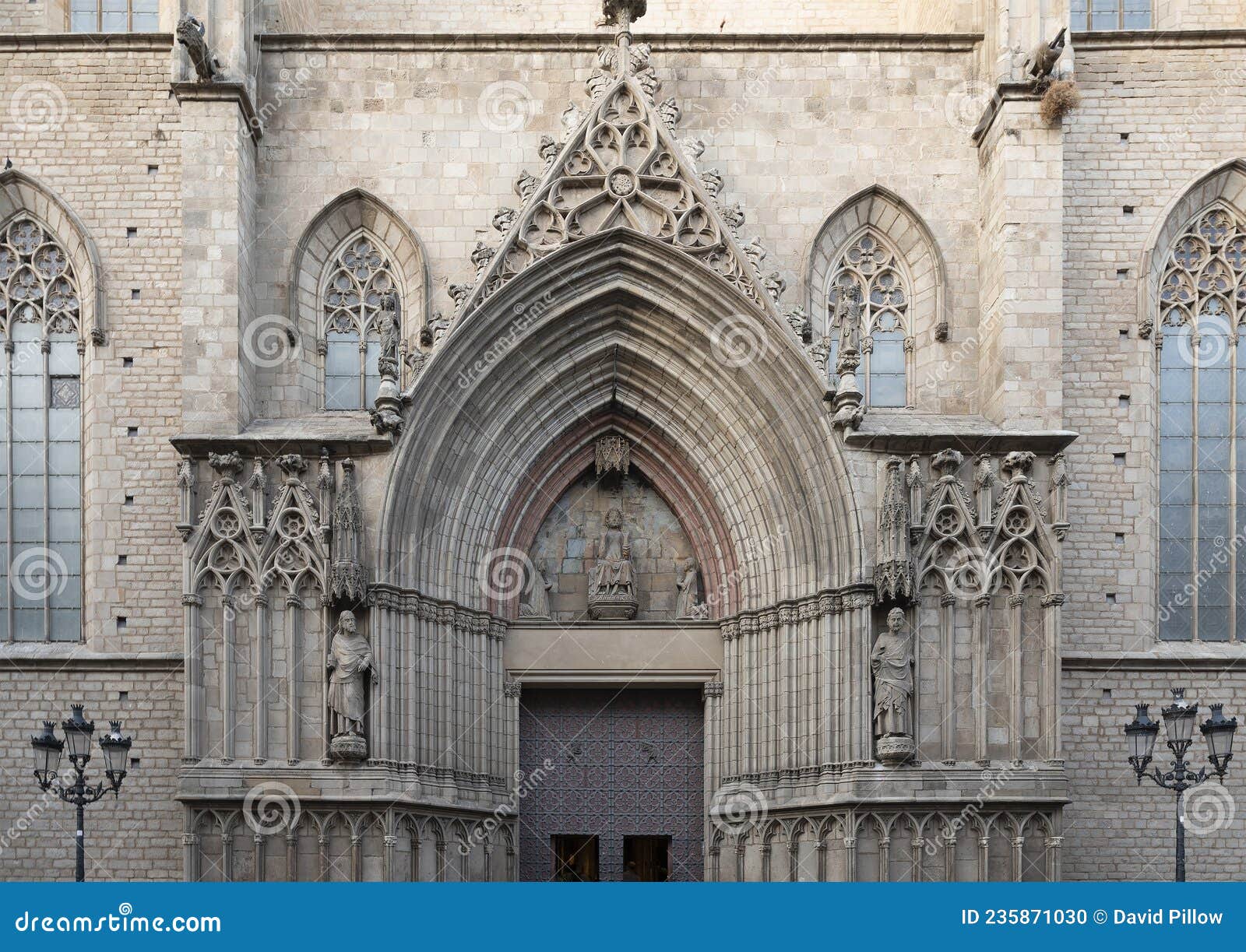 the west entrance to the basilica de santa maria del mar in the ribera district of barcelona, spain.