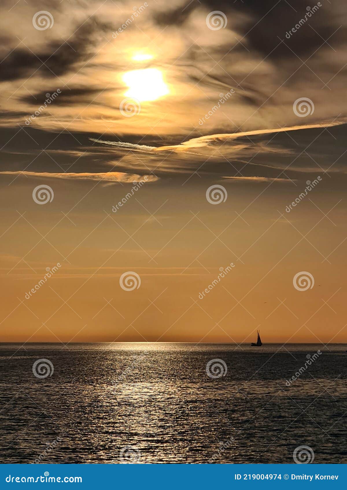 A Picturesque Sunset Leaving a Burning Trace on a Dark Metal Surface of ...