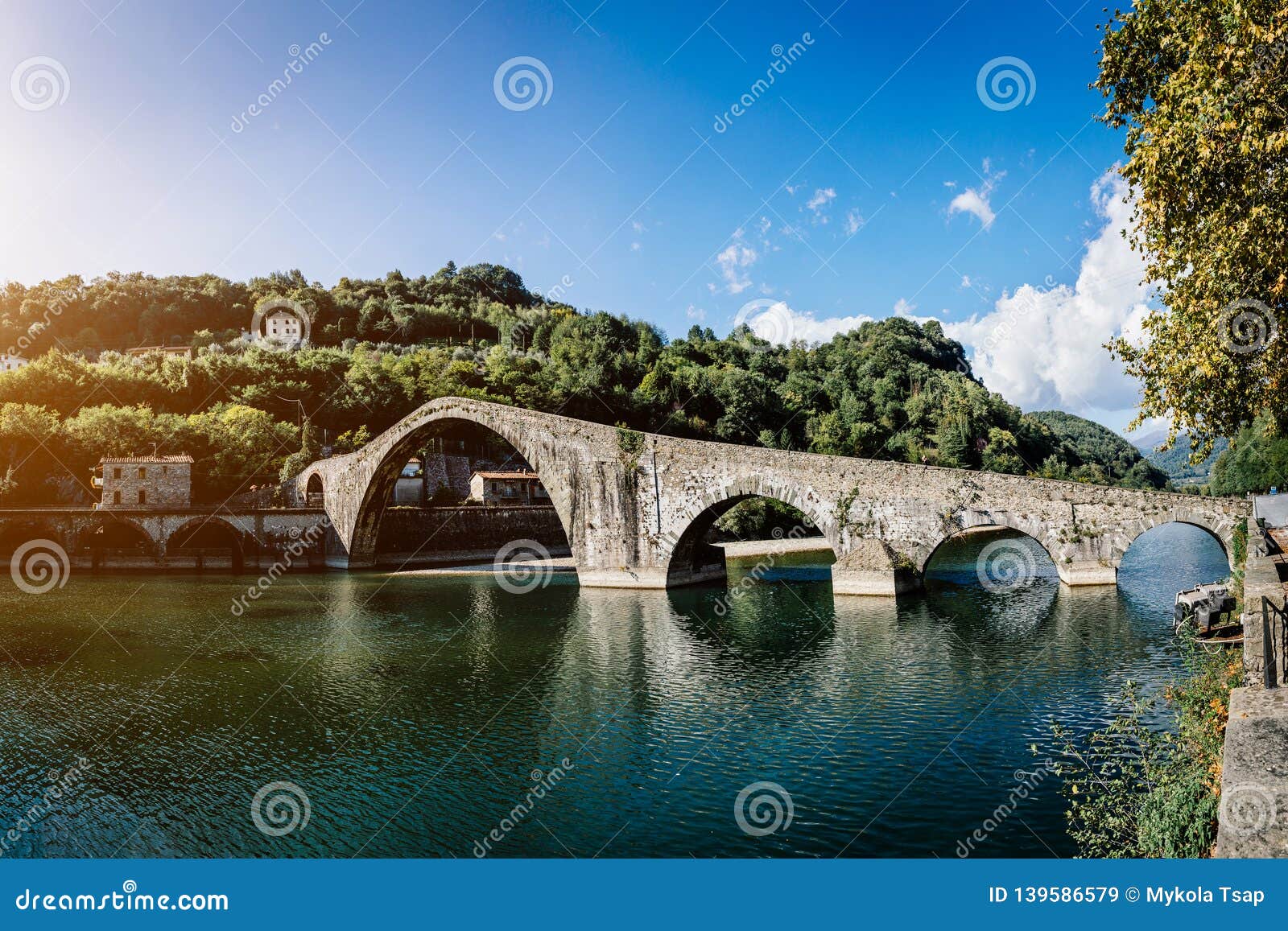 Picturesque View Of Medieval Stone Arch Bridge Ponte Della Maddalena Across River Serchio In Borgo A Mozzano Lucca Tuscany Stock Image Image Of Arch Picturesque 139586579