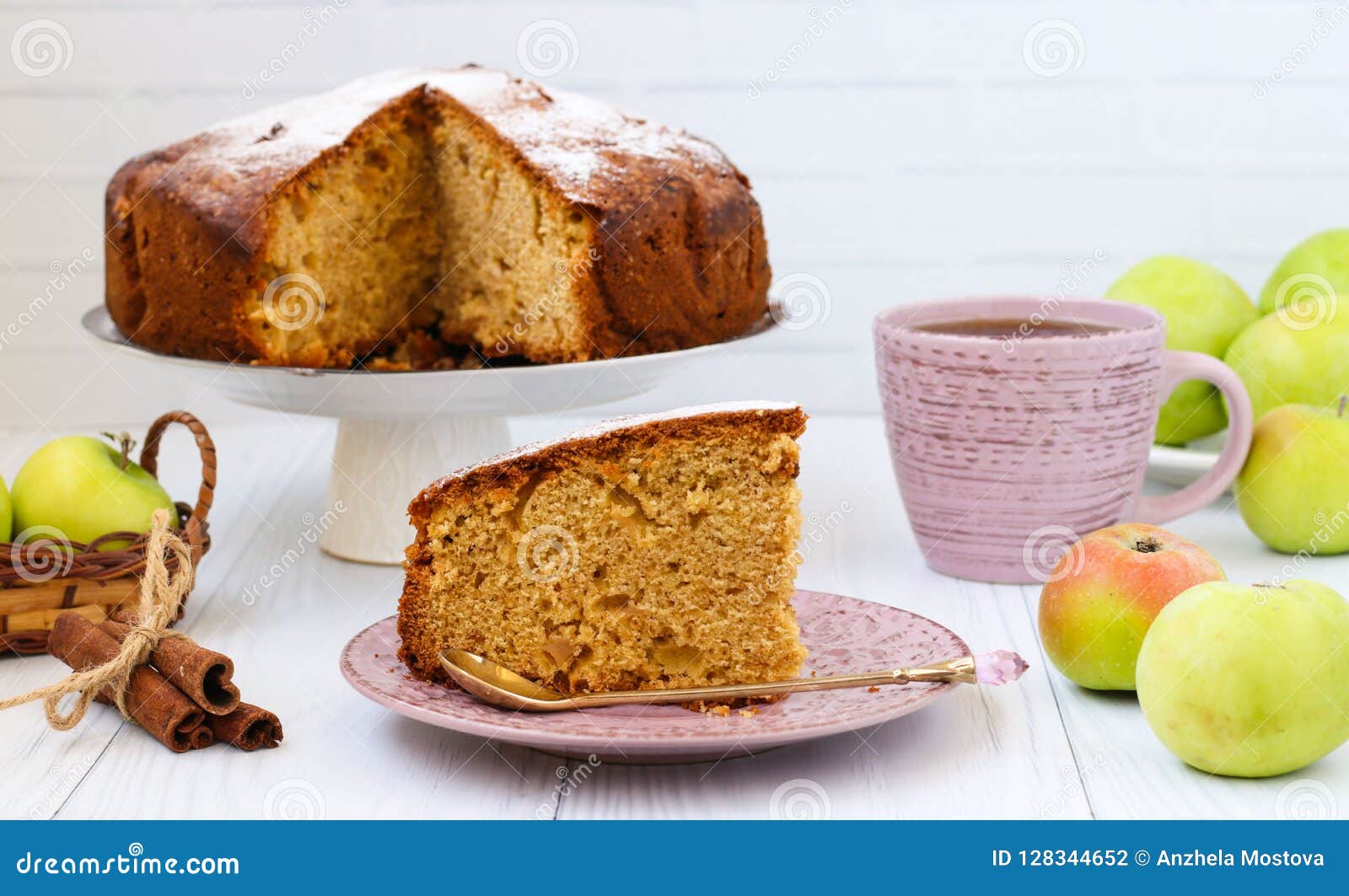 pie with apples, cinnamon and ginger on a white background