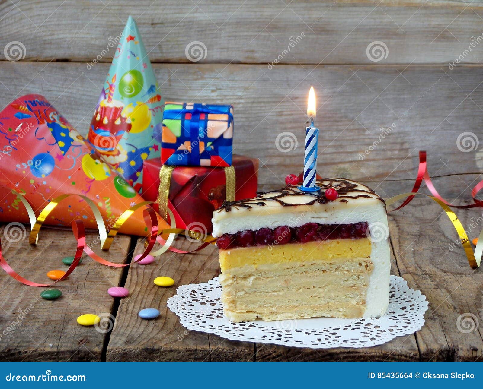 Piece of Cake `Napoleon` with Lighted Candles. Birthday. Side View