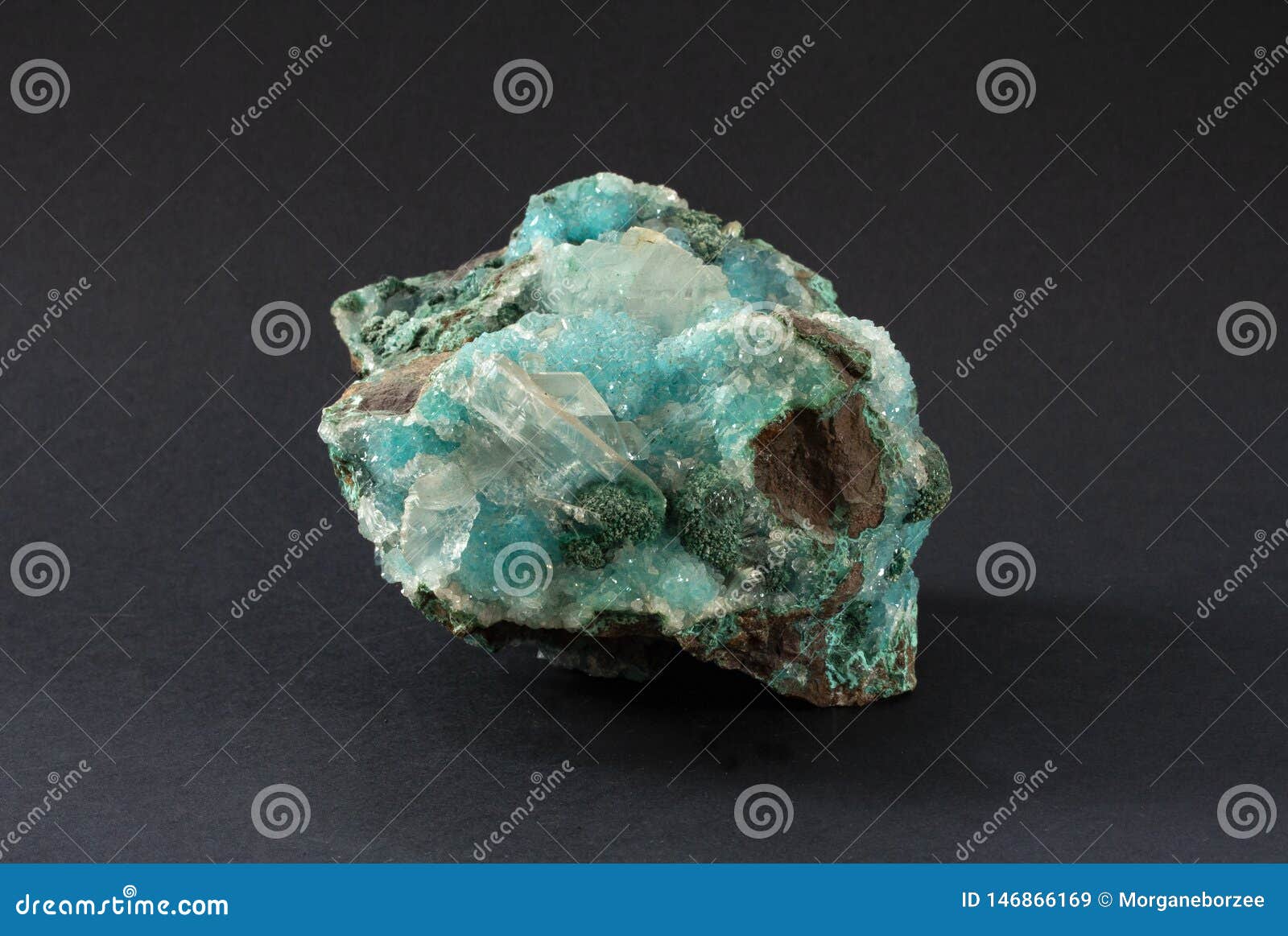 piece of chrysocolla mineral with quartz and gypsum, blue turquoise crystals.