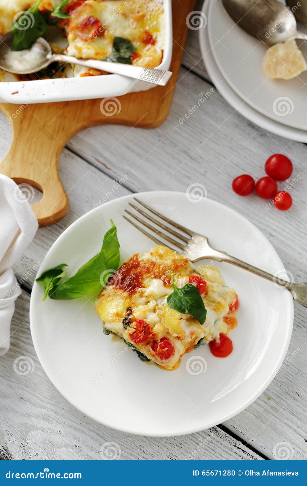 Piece of lasagna on plate stock photo. Image of layer - 65671280