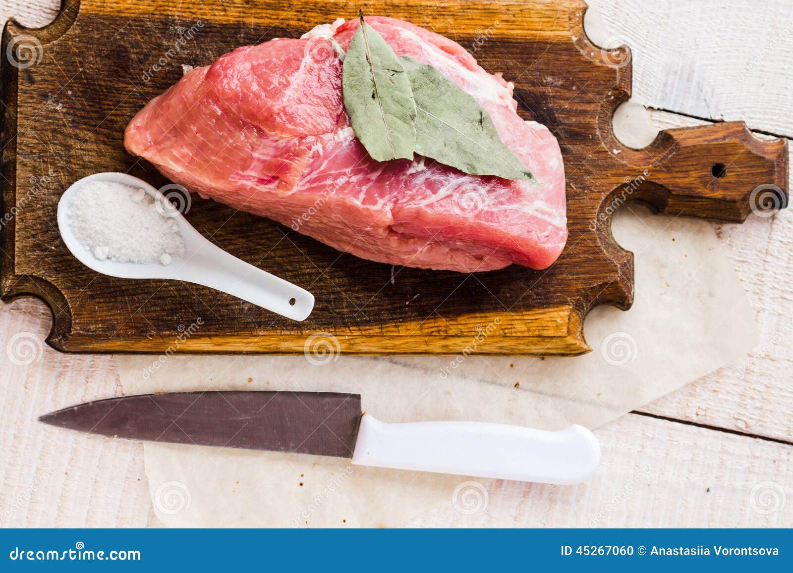 Piece of Pork on a Cutting Board, a Bay Leaf Stock Photo Image of