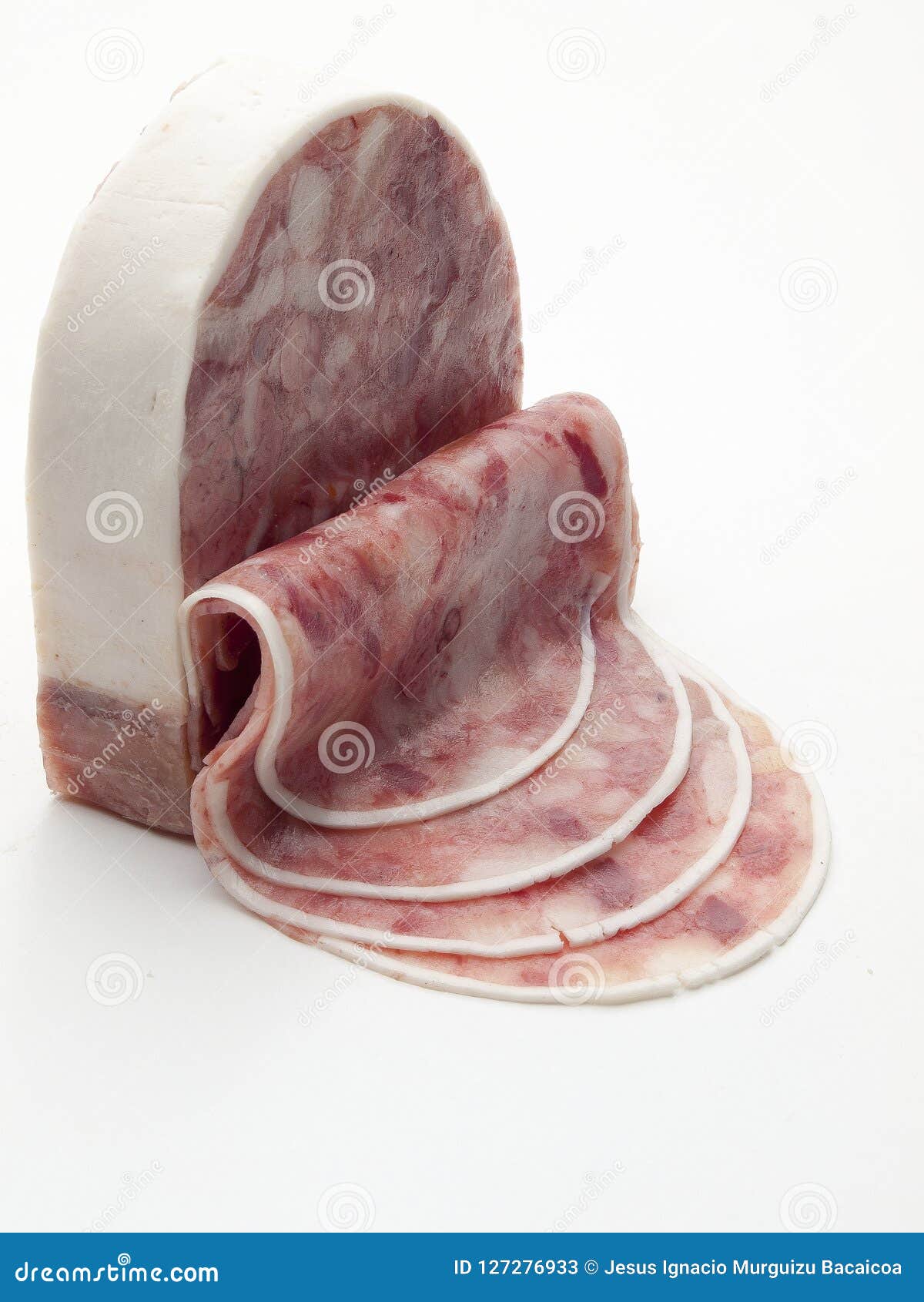 piece of sausage of wild boar meat cut into slices.