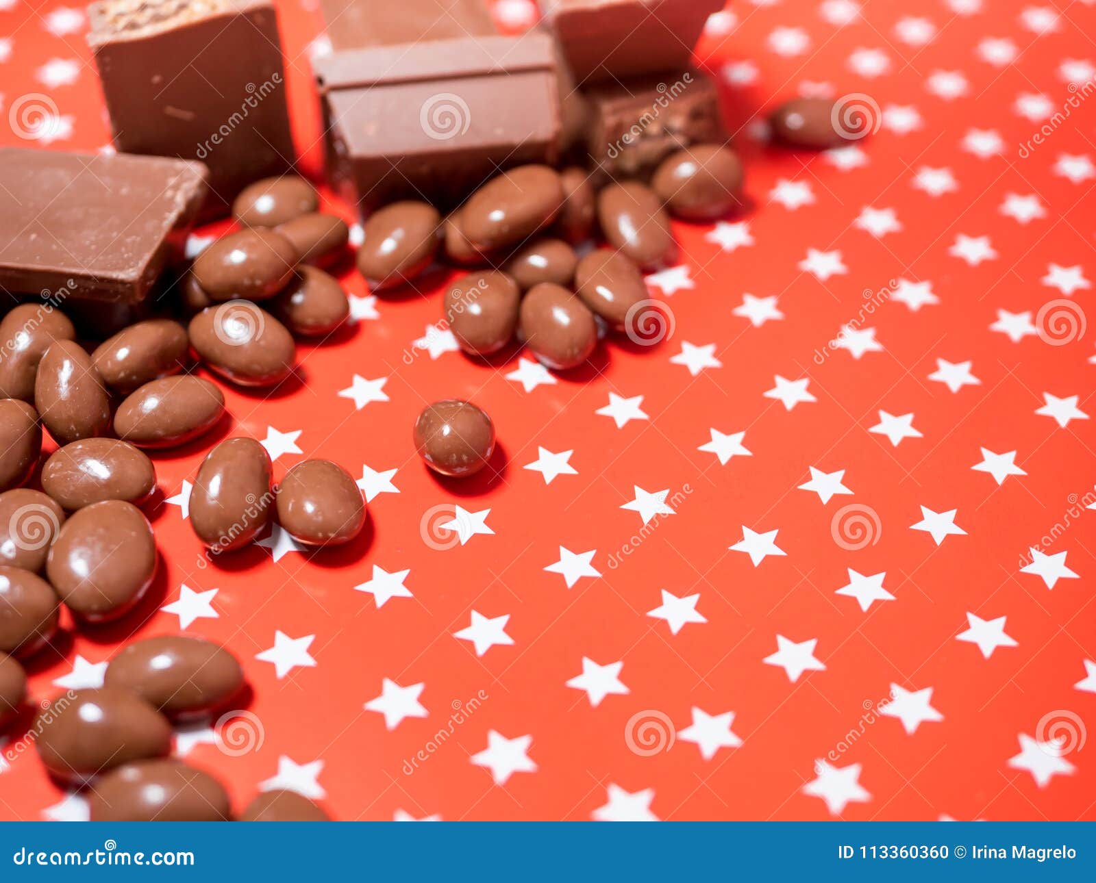 Pieces of Chocolates on Red Background Stock Photo - Image of decor