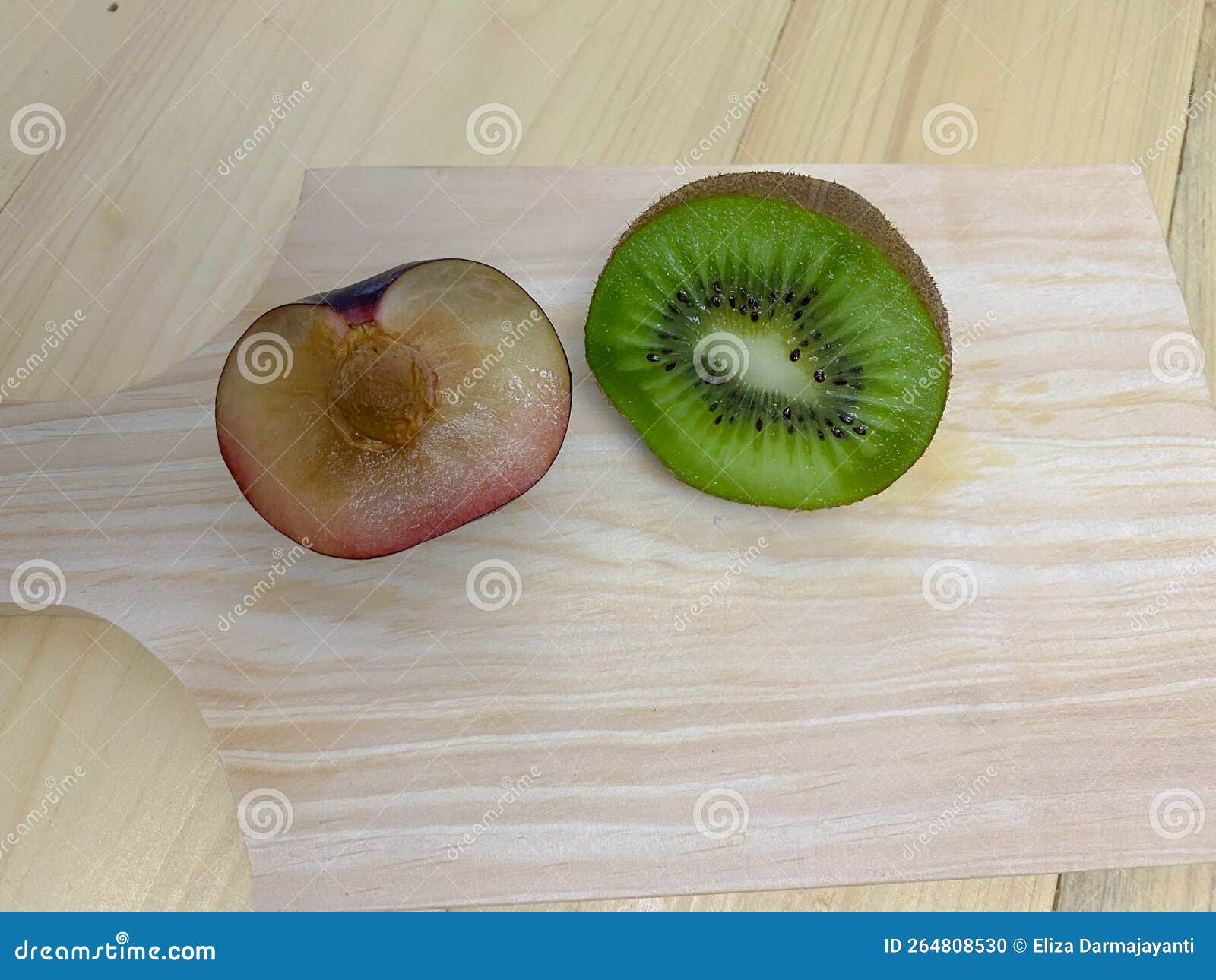 Pieces of Kiwi Fruit and Pieces of Plums Stock Photo Image of seed