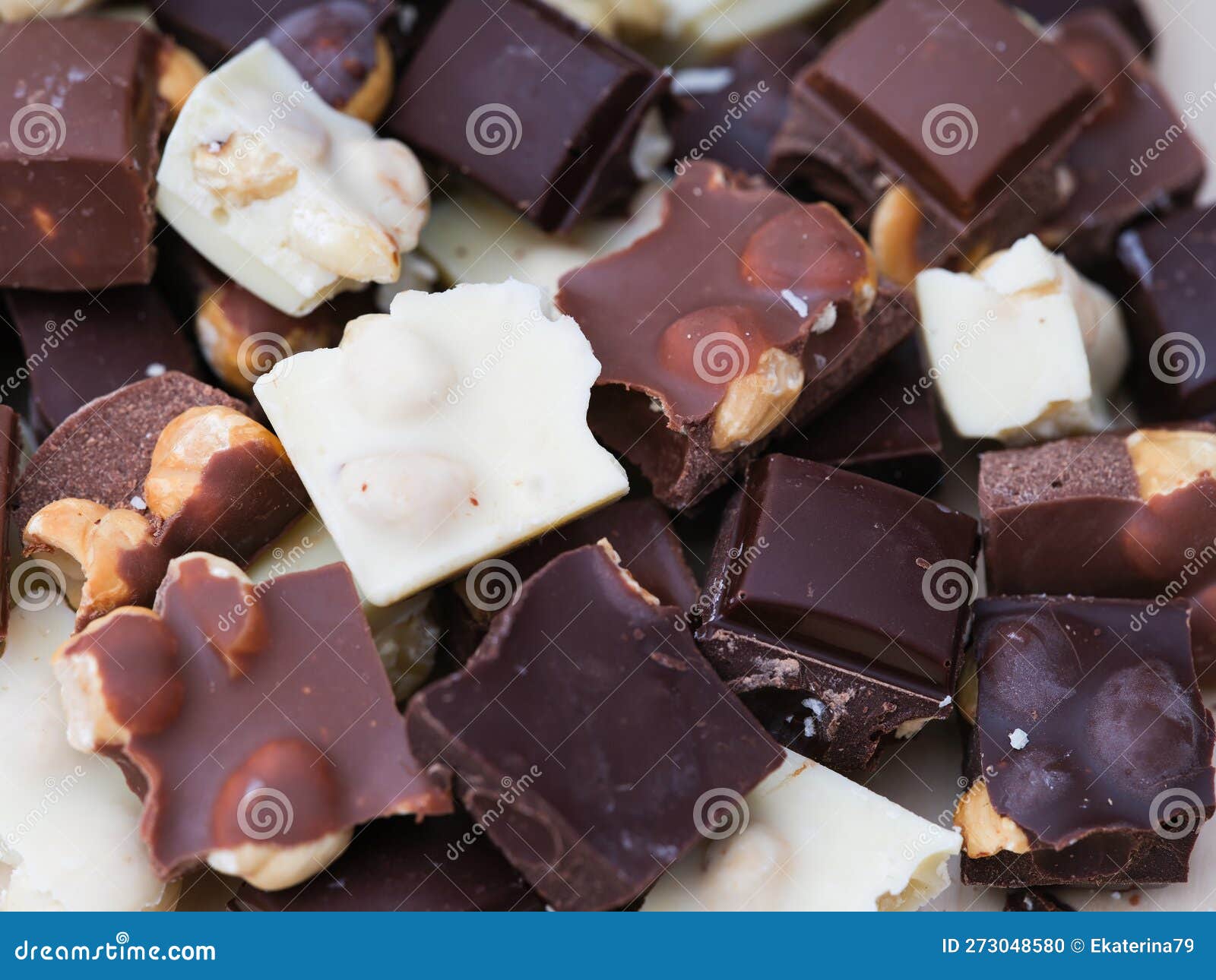 Pieces of Milk Chocolate, White Chocolate and Dark Chocolate with