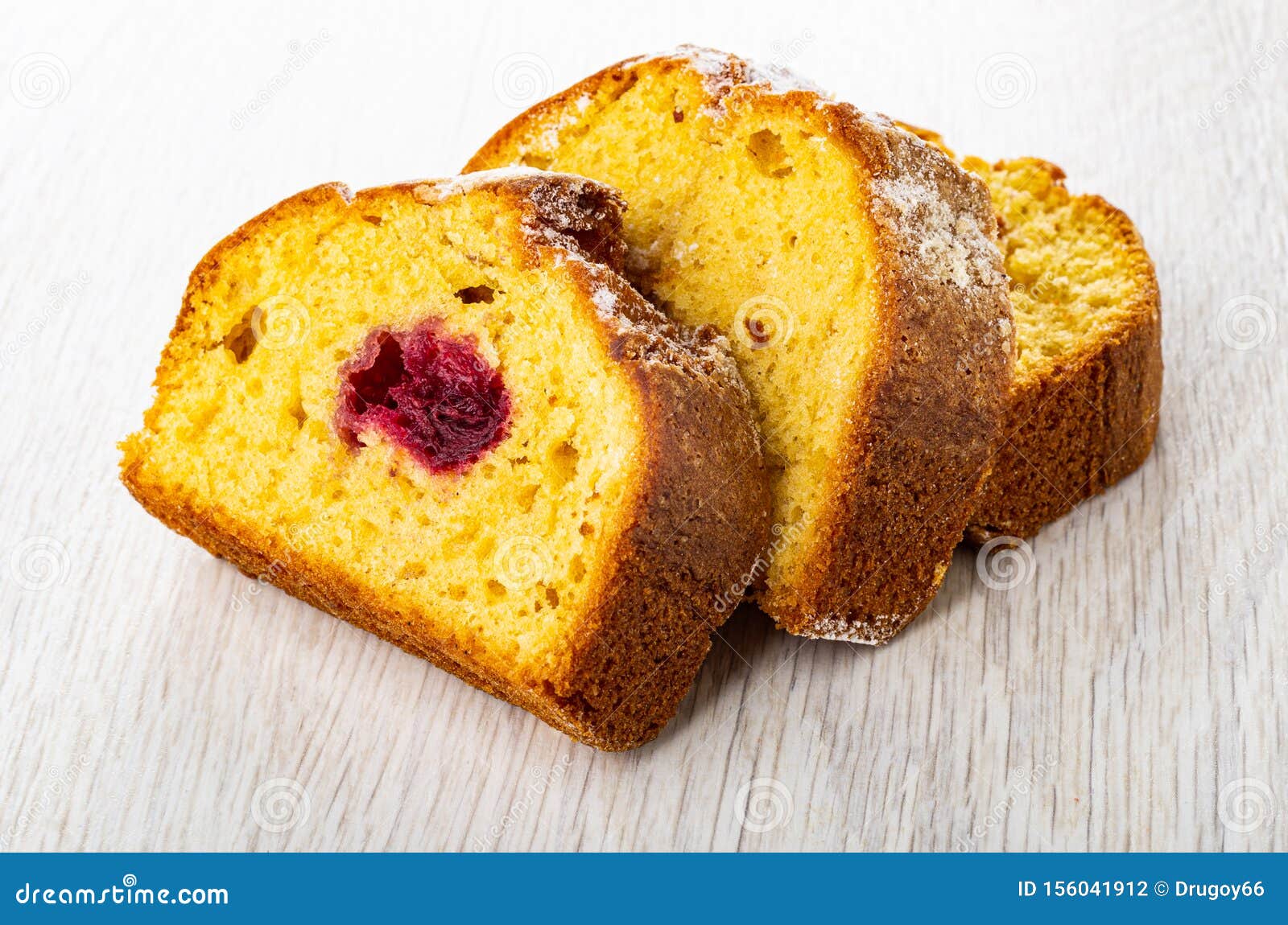 Download Pieces Of Muffin With Cherry Jam On Wooden Table Stock ...