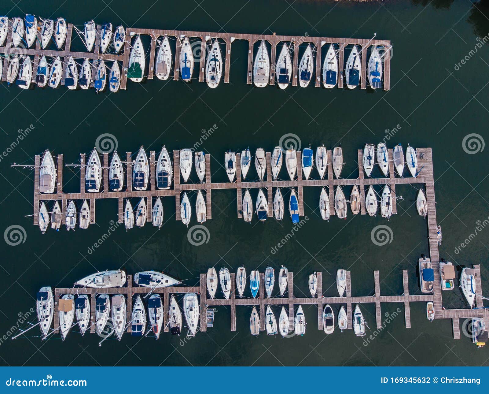 pier with boats overlook by dji mavic mini