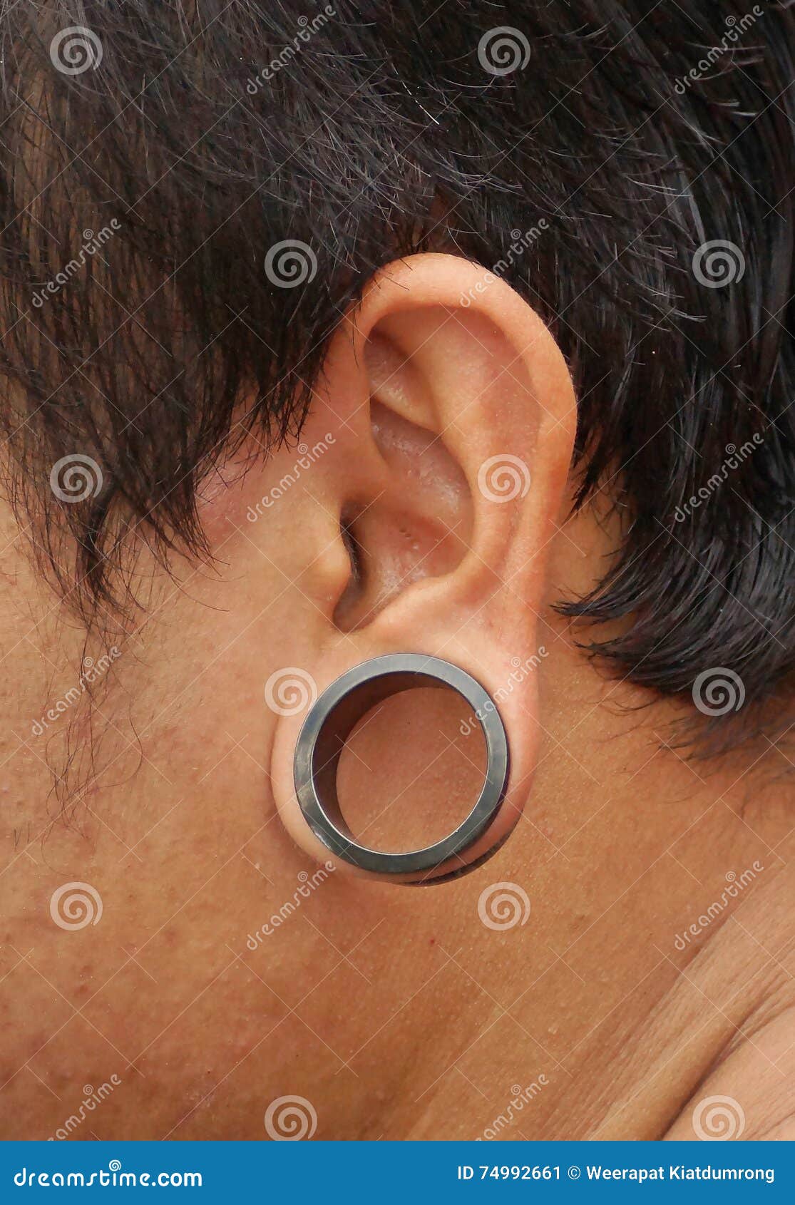 Male ear with a ring stock photo. Image of jewelry, piercing - 74566308