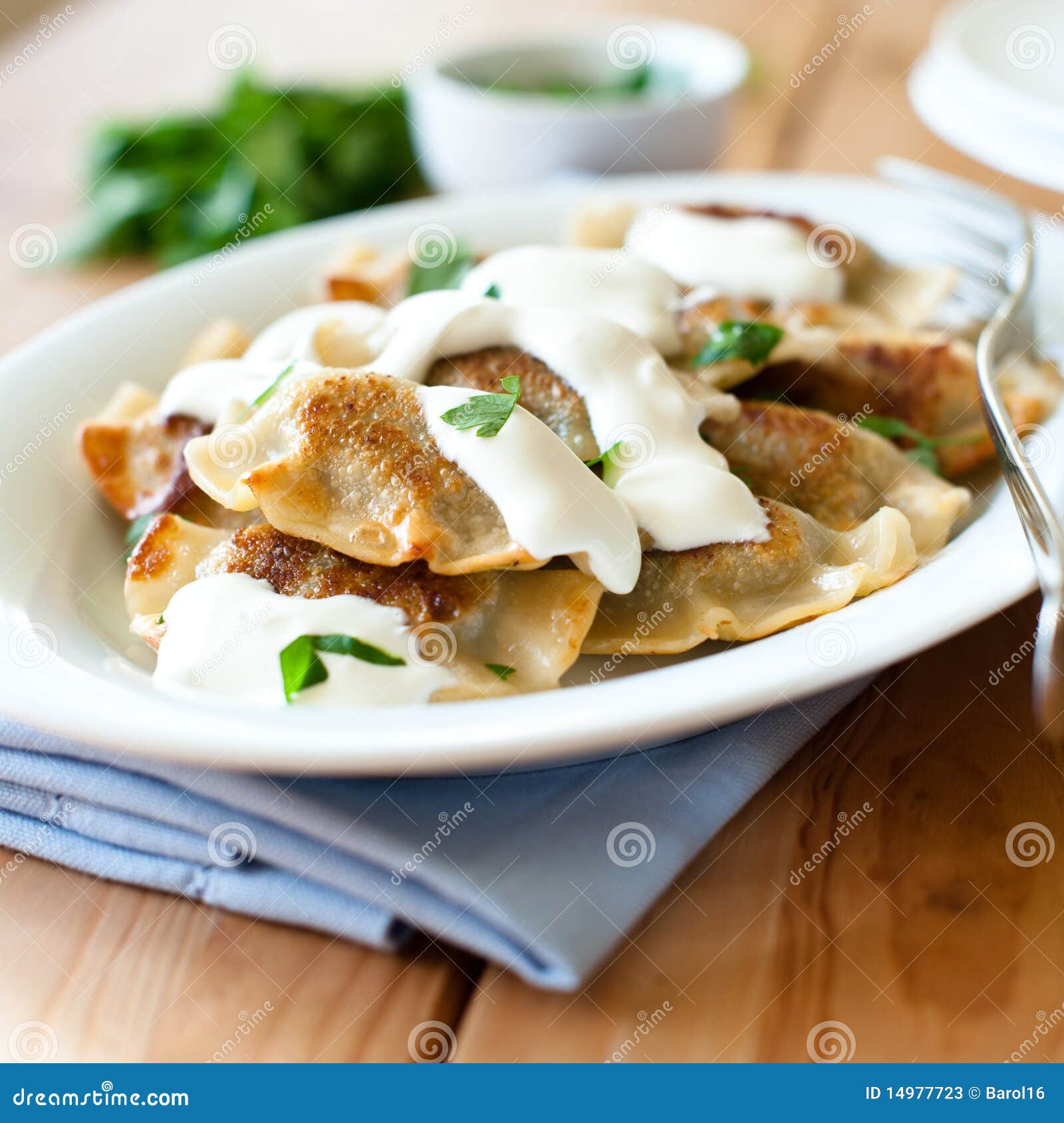 pierogi with sour cream