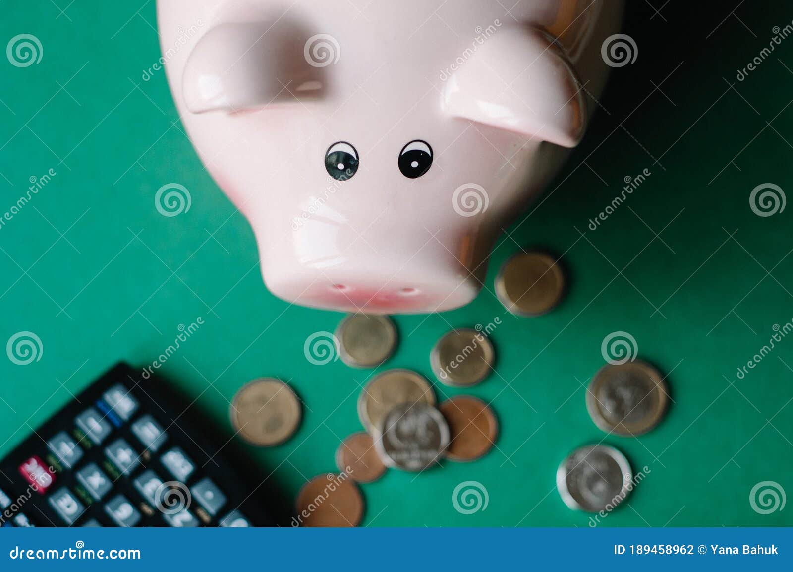 piggy bank with money, cute piggy bank on color background