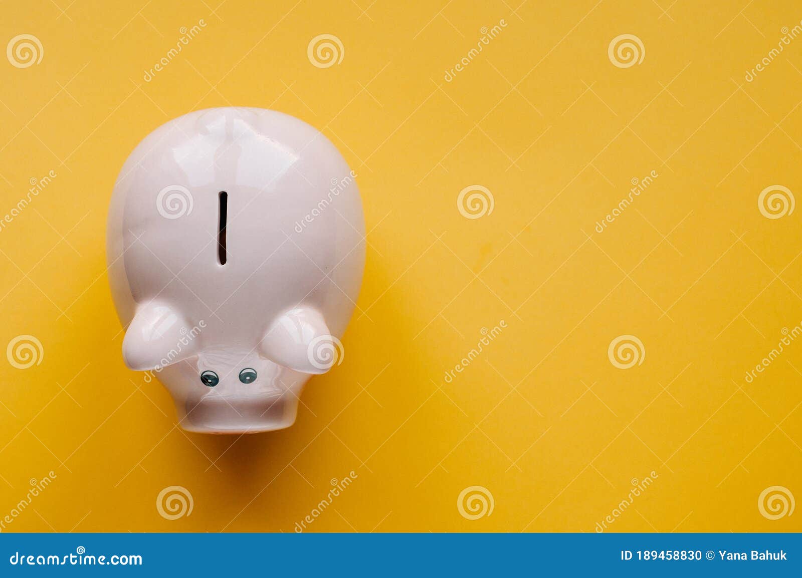 a piggy bank saving and investment theme on a yellow paper background