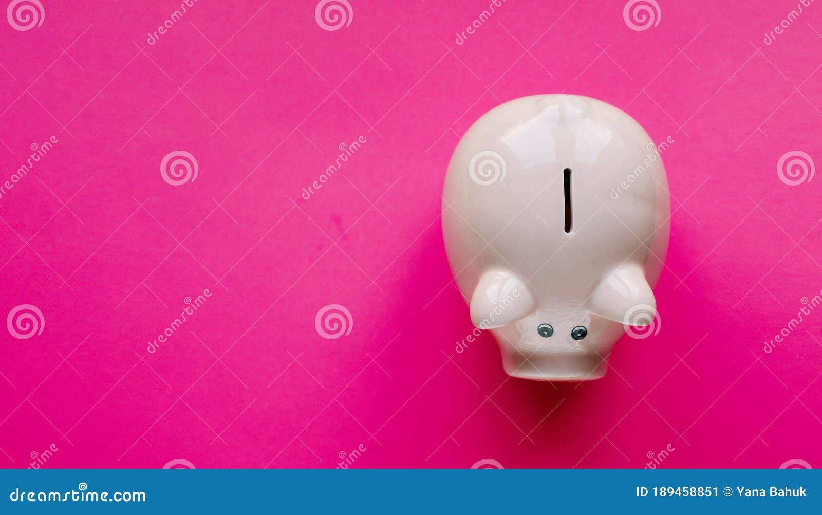 a piggy bank saving and investment theme on a pink paper background