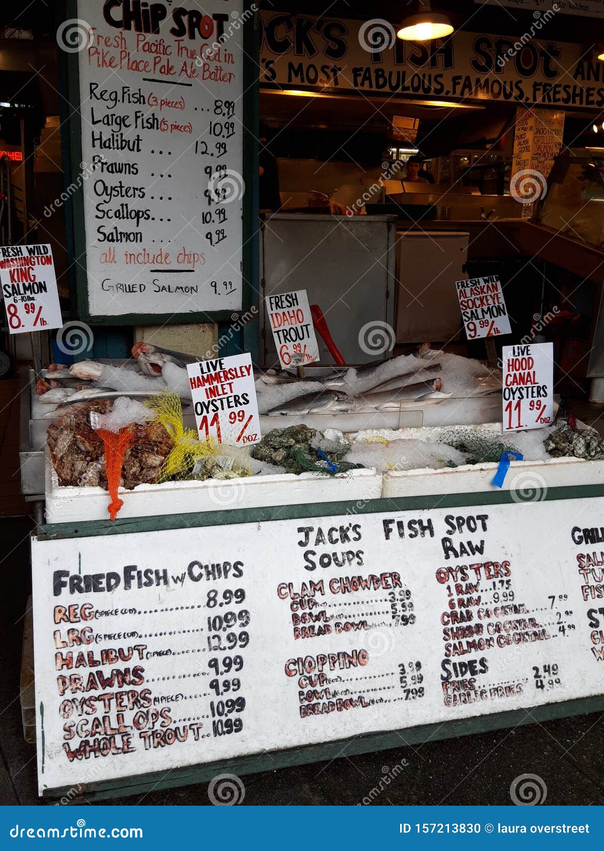 Fish Stand In A Supermarket. Squid Shrimp Red Mullet. Fish In Ice