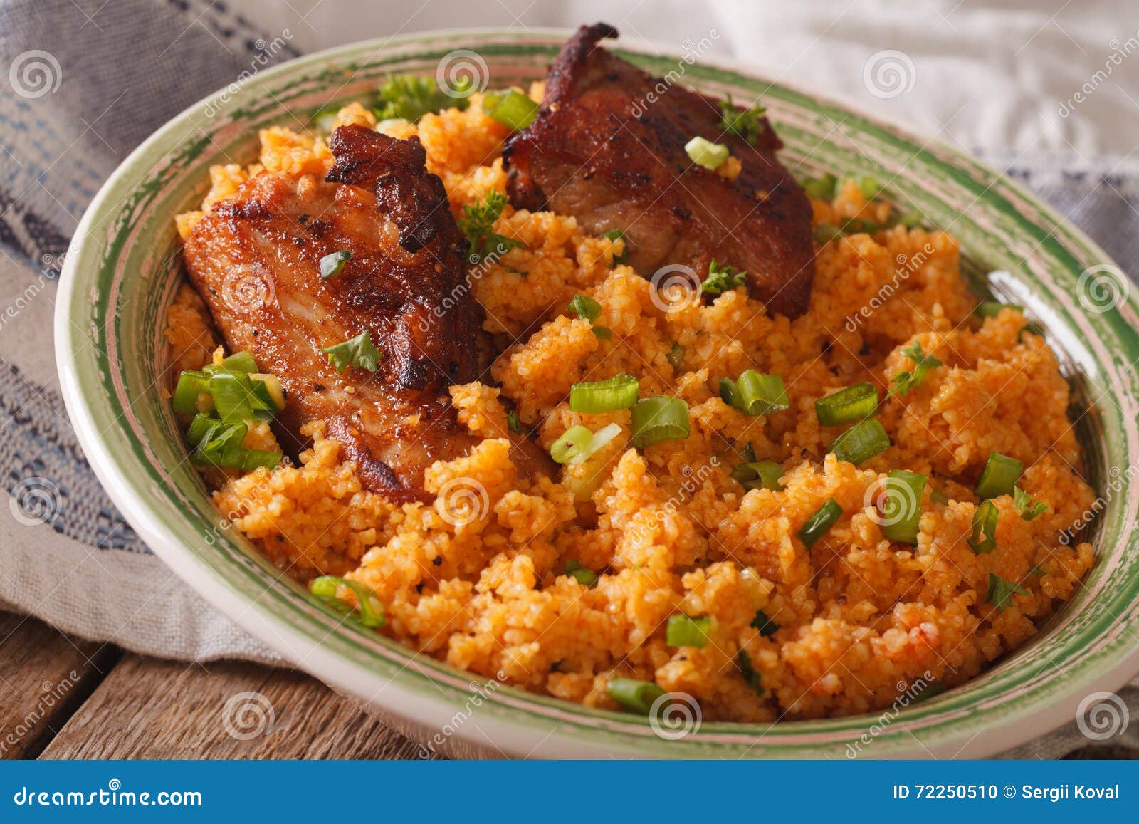 Pilaf Bulgur with Beef Closeup on a Plate. Horizontal Stock Photo