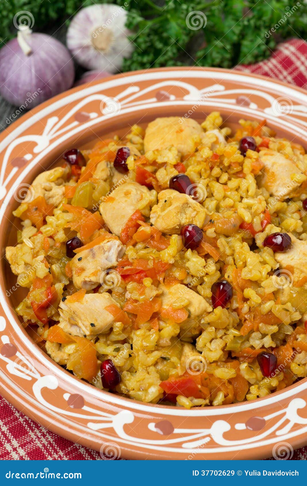 Pilaf with Vegetables, Chicken and Pomegranate, Closeup Stock Image
