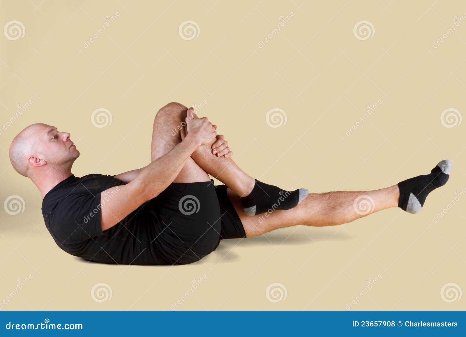 Pilates Position - Single Leg Stretch Stock Photo - Image of