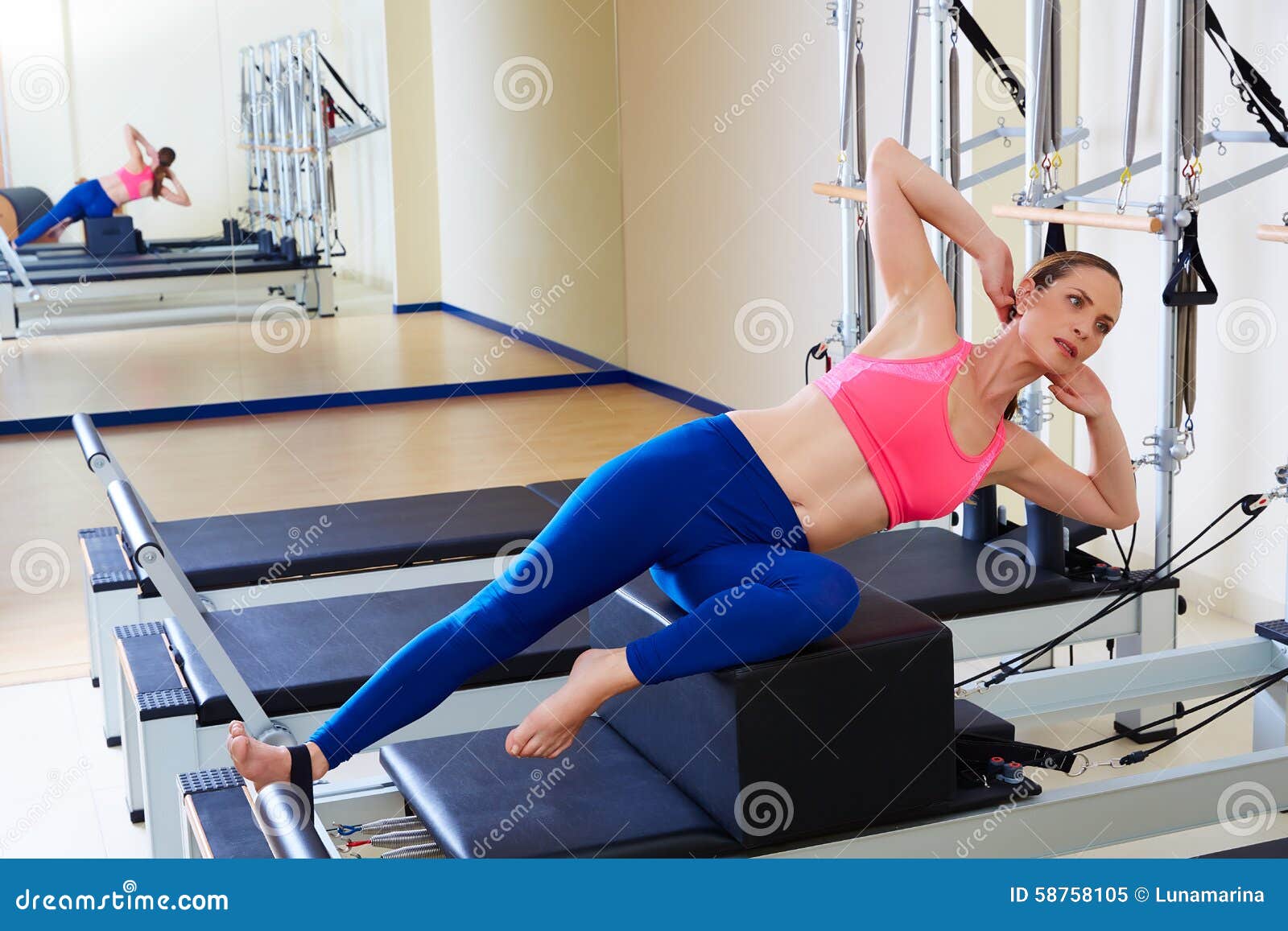 pilates reformer woman short box side stretch