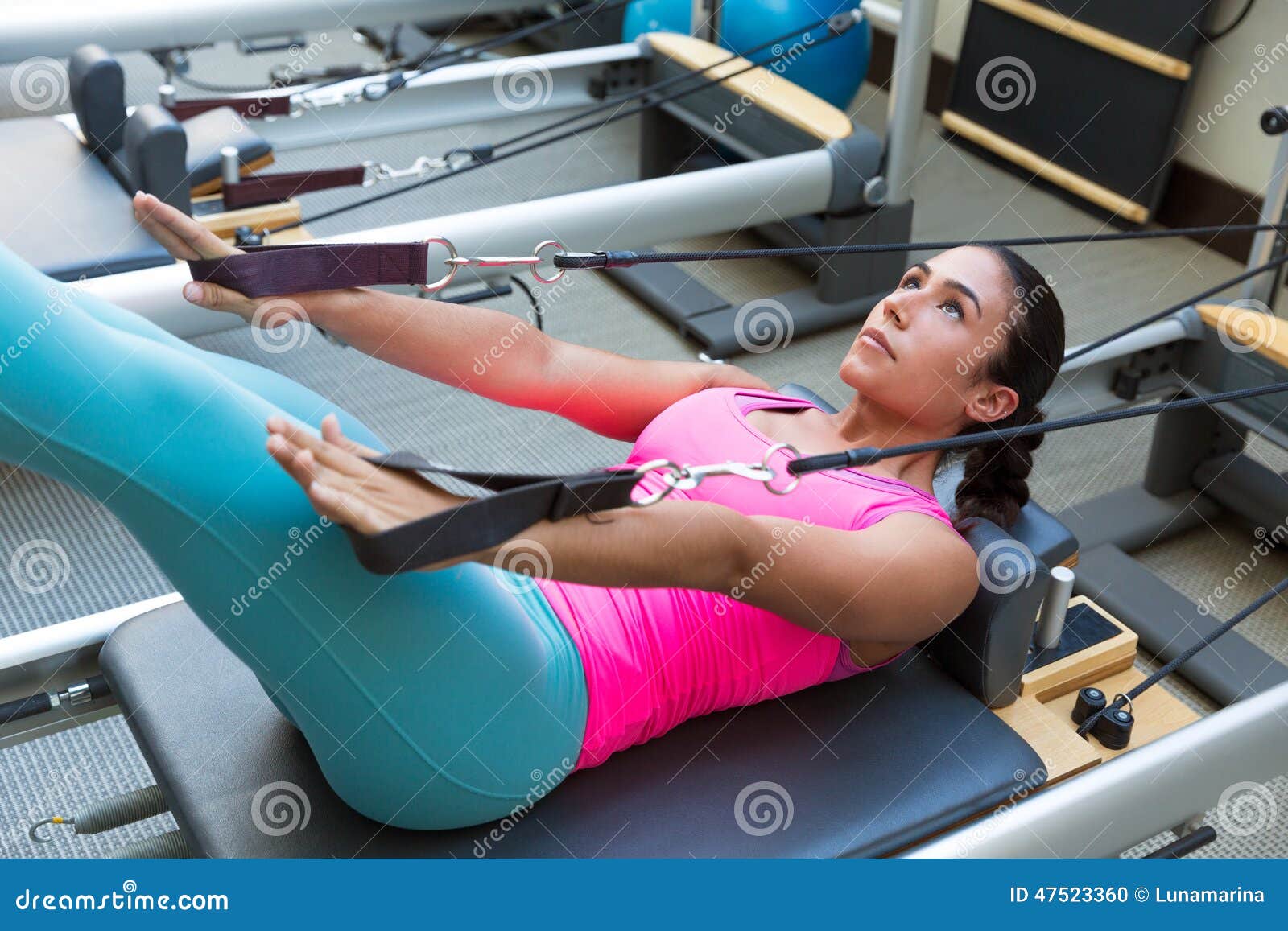 pilates reformer workout exercises woman