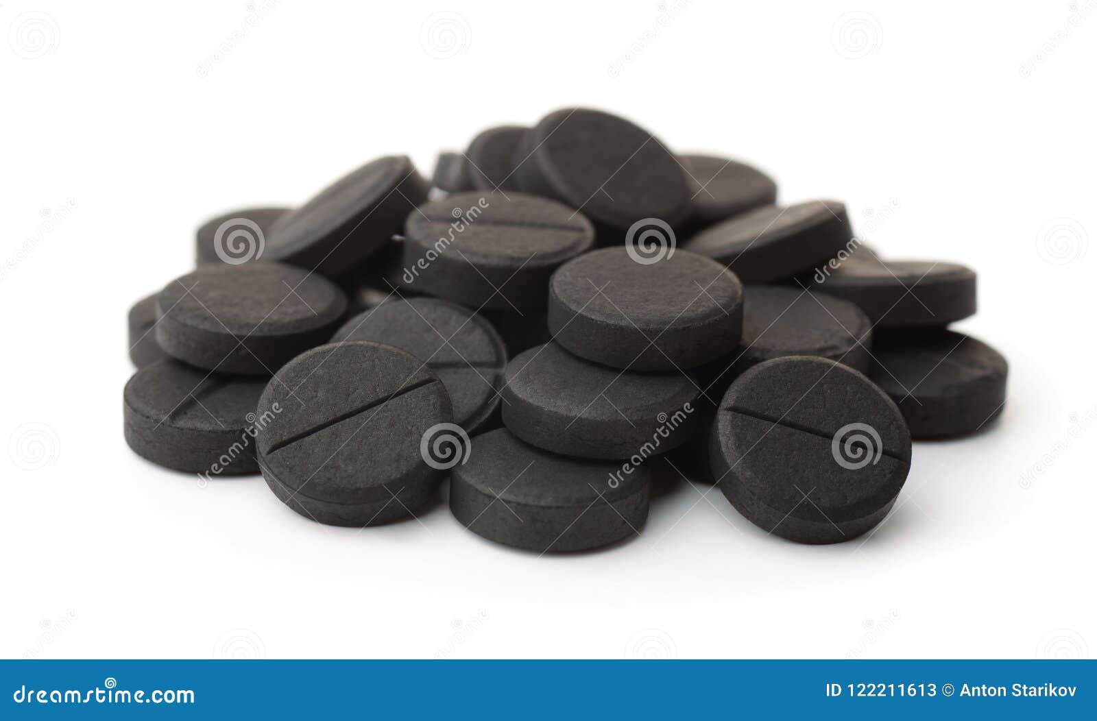 pile of activated charcoal pills