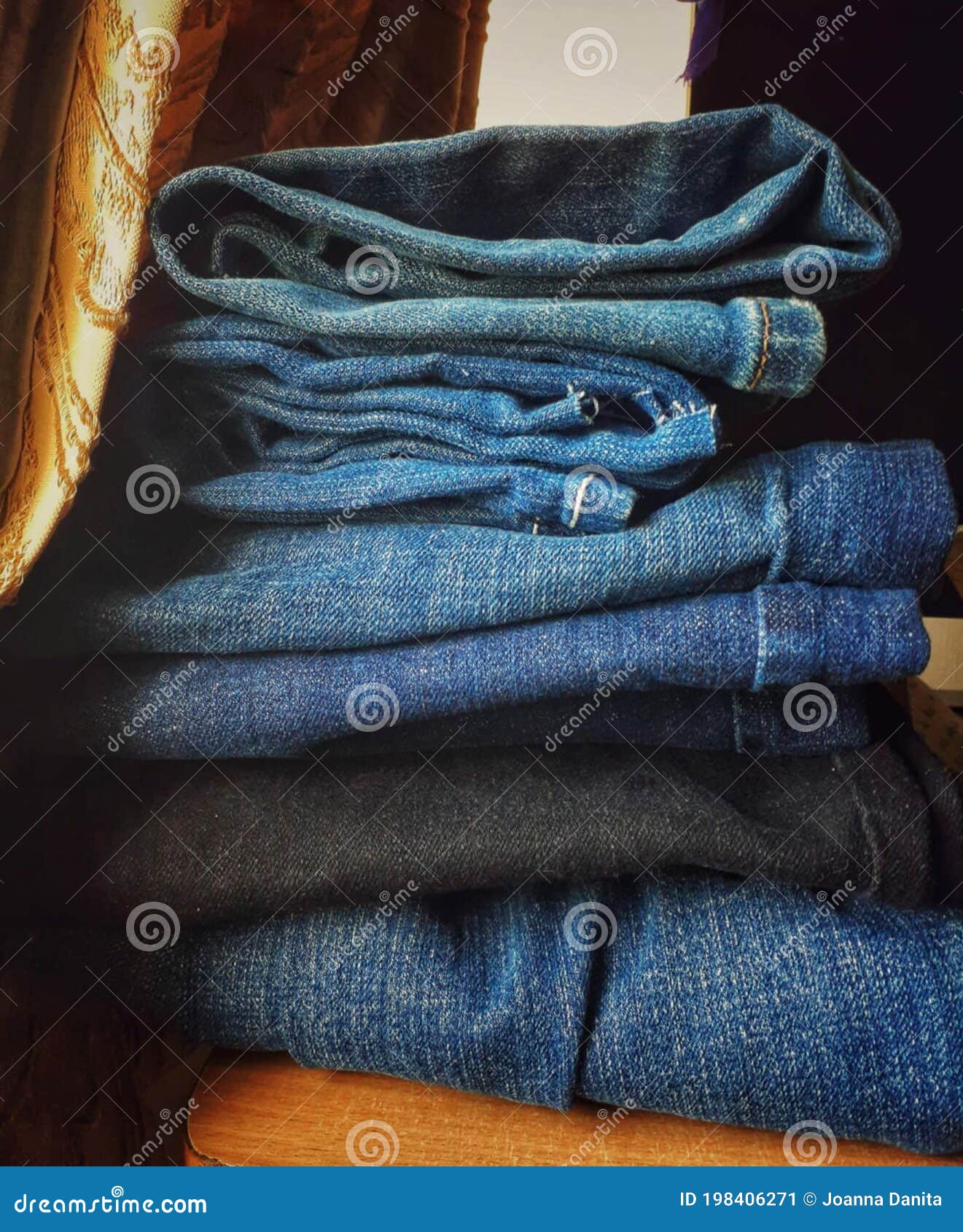 A pile of blue denim jeans stock image. Image of denim - 198406271