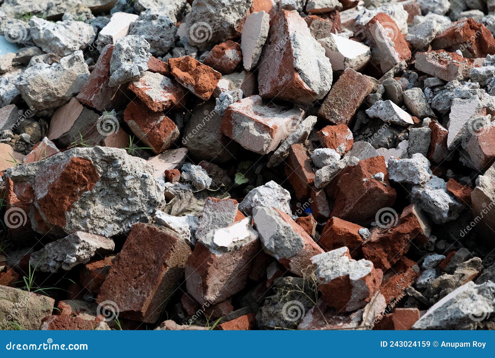 Pile of Bricks Concrete Construction Garbage at a Demolished Site Stock