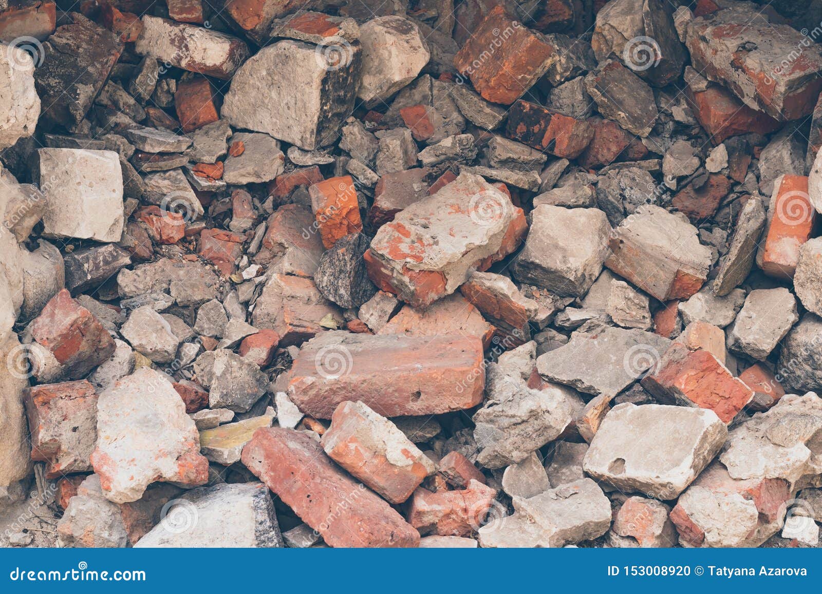 pile of broken bricks, background. texture, pattern, brick wall collapse. destruction surface of building`s facade. debris.