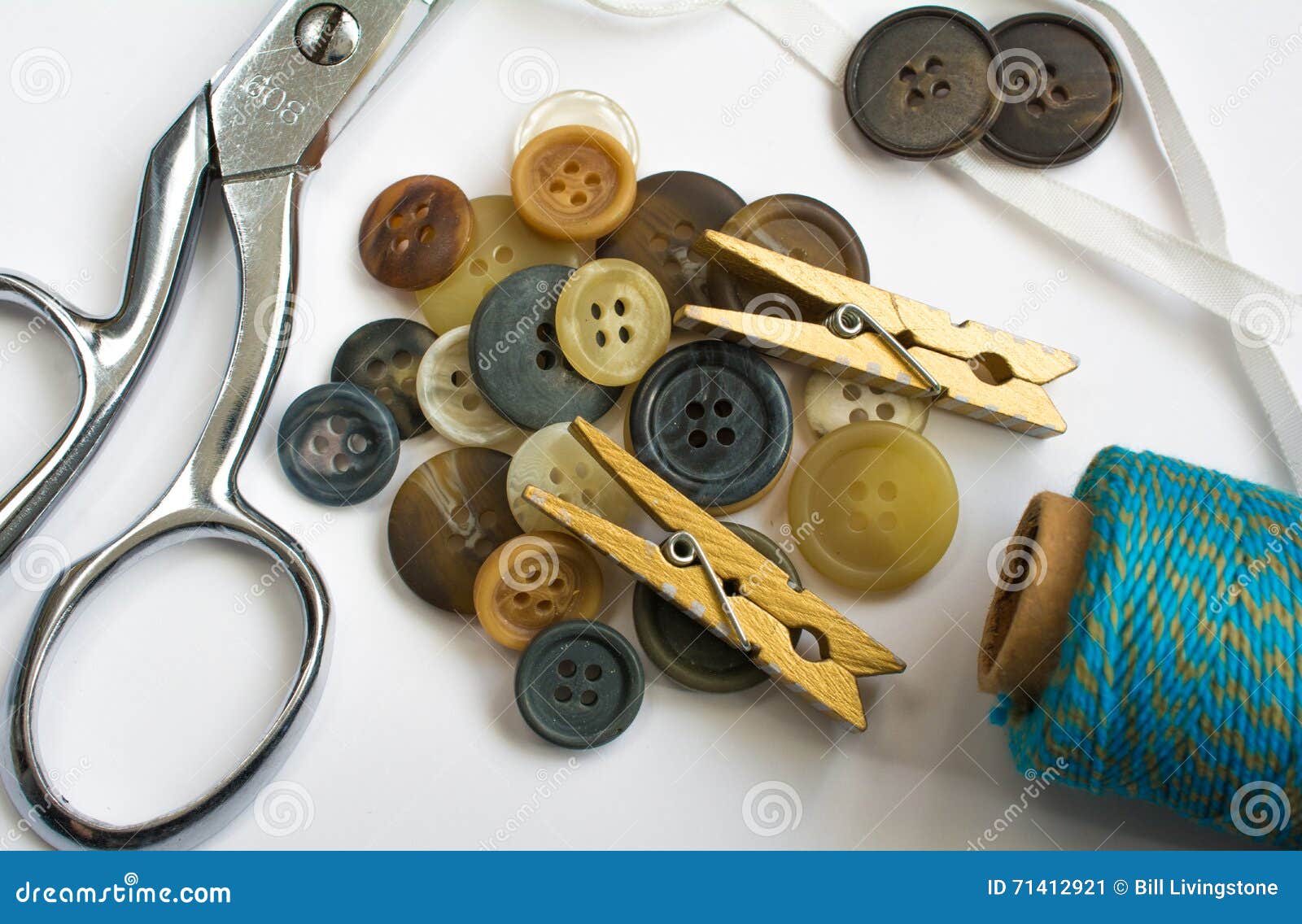 Pile of Buttons with Sewing Materials and Clothes Pins Isolated Stock