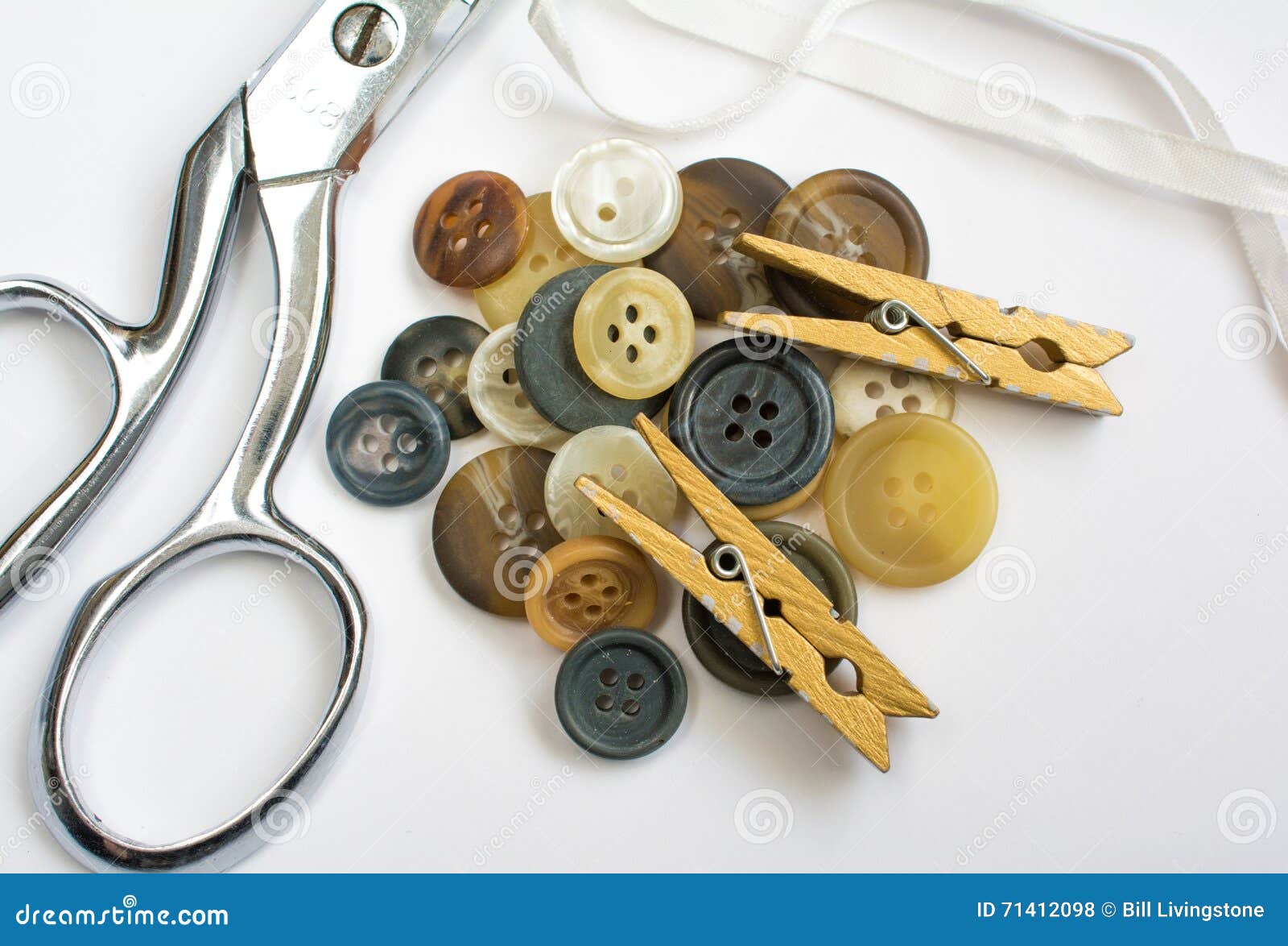 Pile of Buttons with Sewing Materials Isolated on White Stock Photo