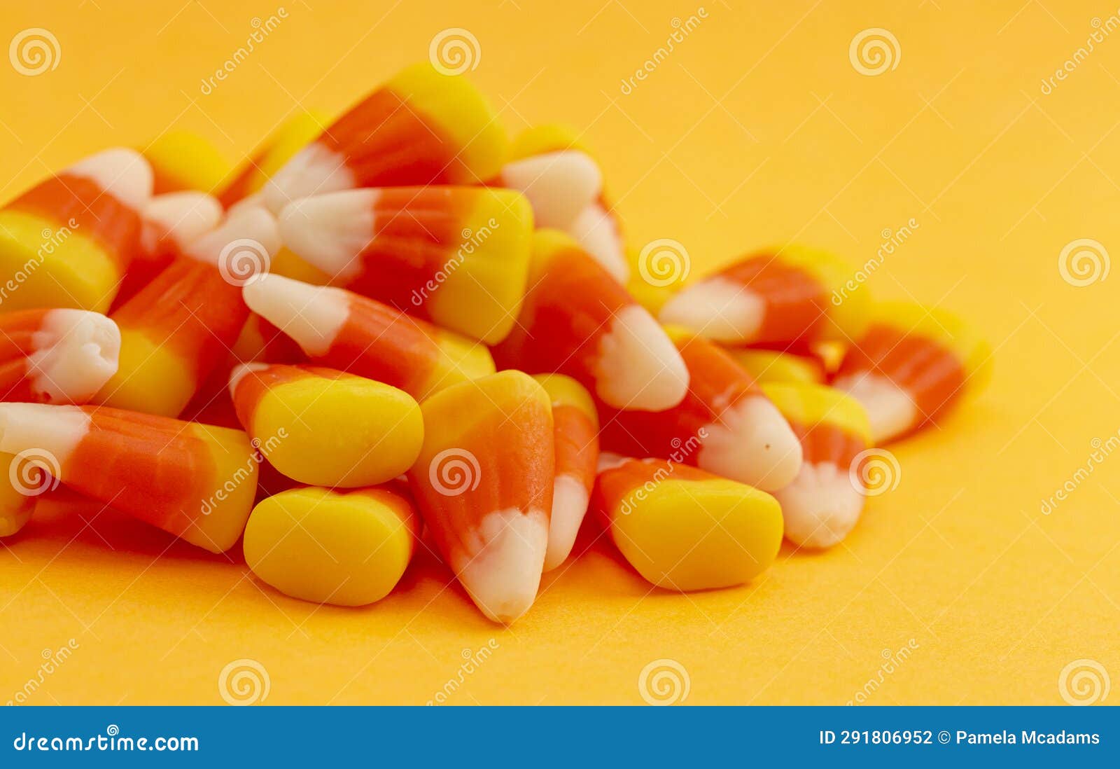 A Pile of Classic Candy Corn on Yellow Orange Background Stock Photo Image of sweet, festival