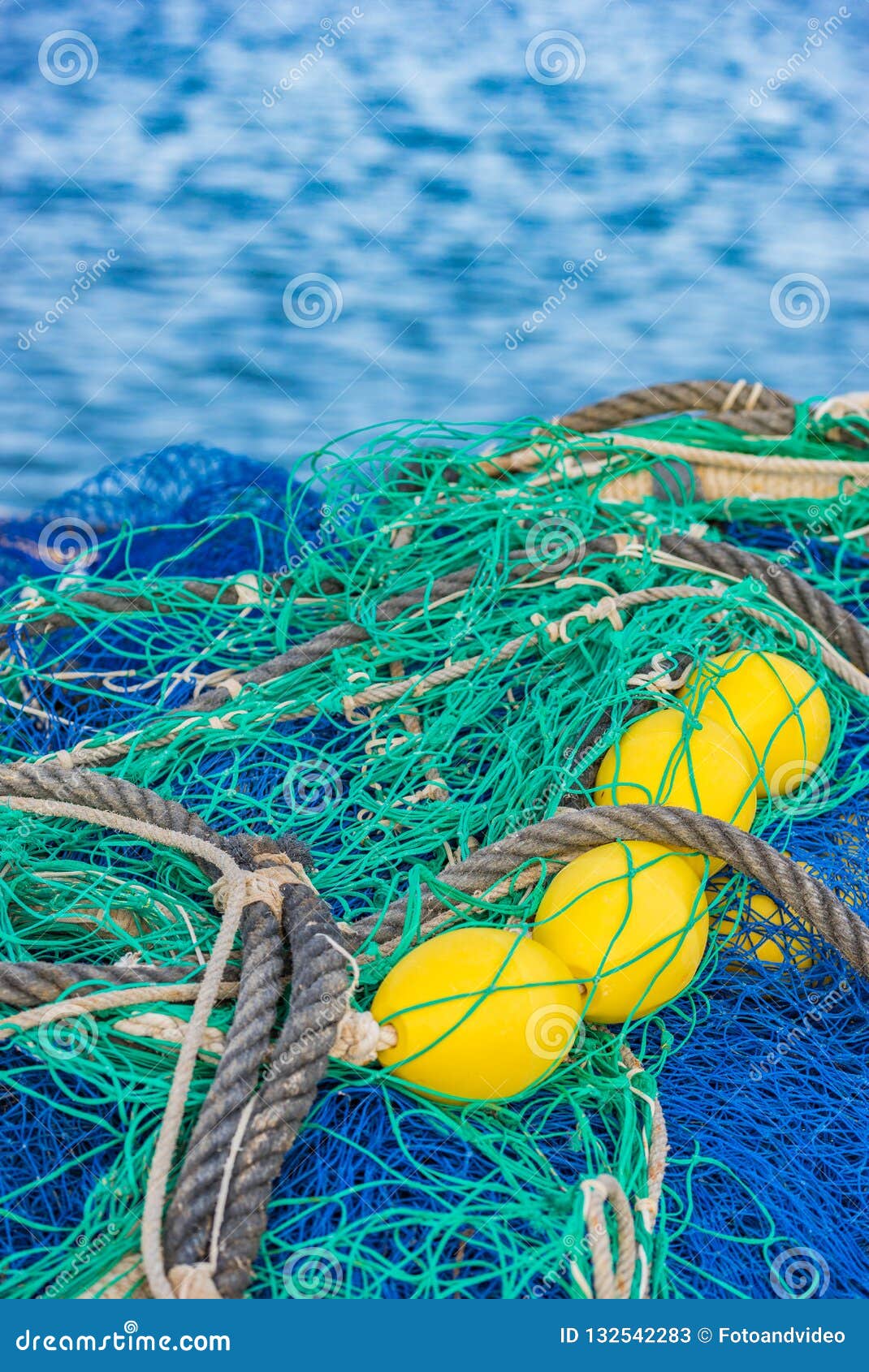 Pile of Commercial Fishing Net at Port Harbour with Sea Water Background  Stock Image - Image of coastline, buoy: 132542283