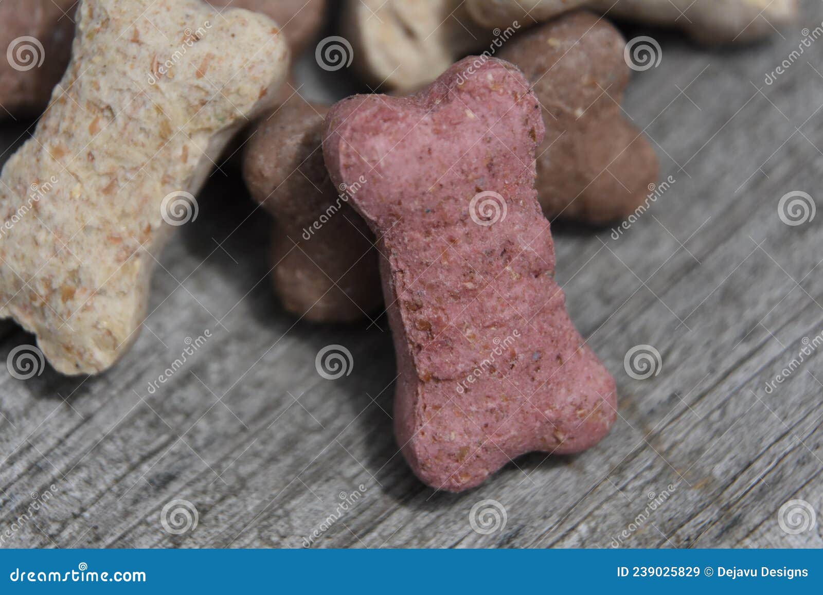 pile of different color dog biscuits stacked up