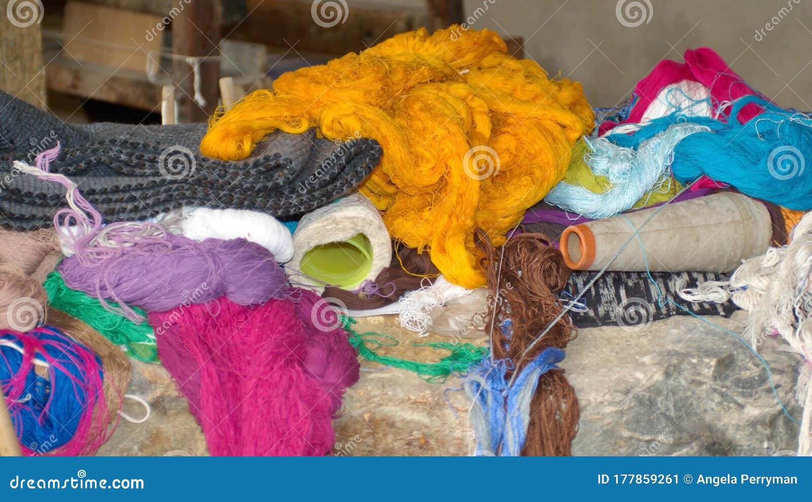pile of dyed thread and fabric