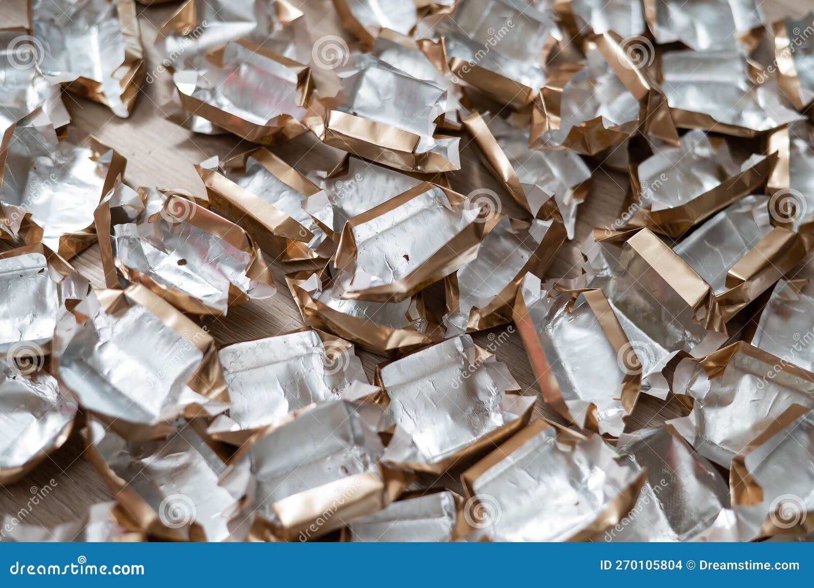 Pile of Empty Silvergold Candy Wrappers. Top View. Stock Photo Image of confection, silver