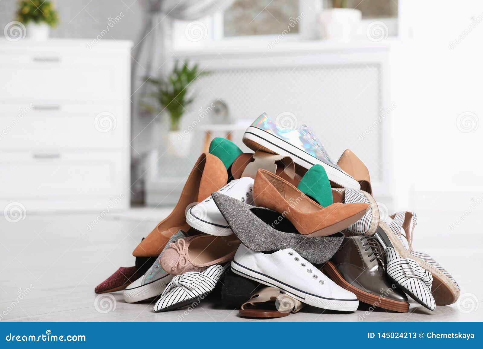 Pile of Female Shoes on Floor Stock Image - Image of heap, bunch: 145024213