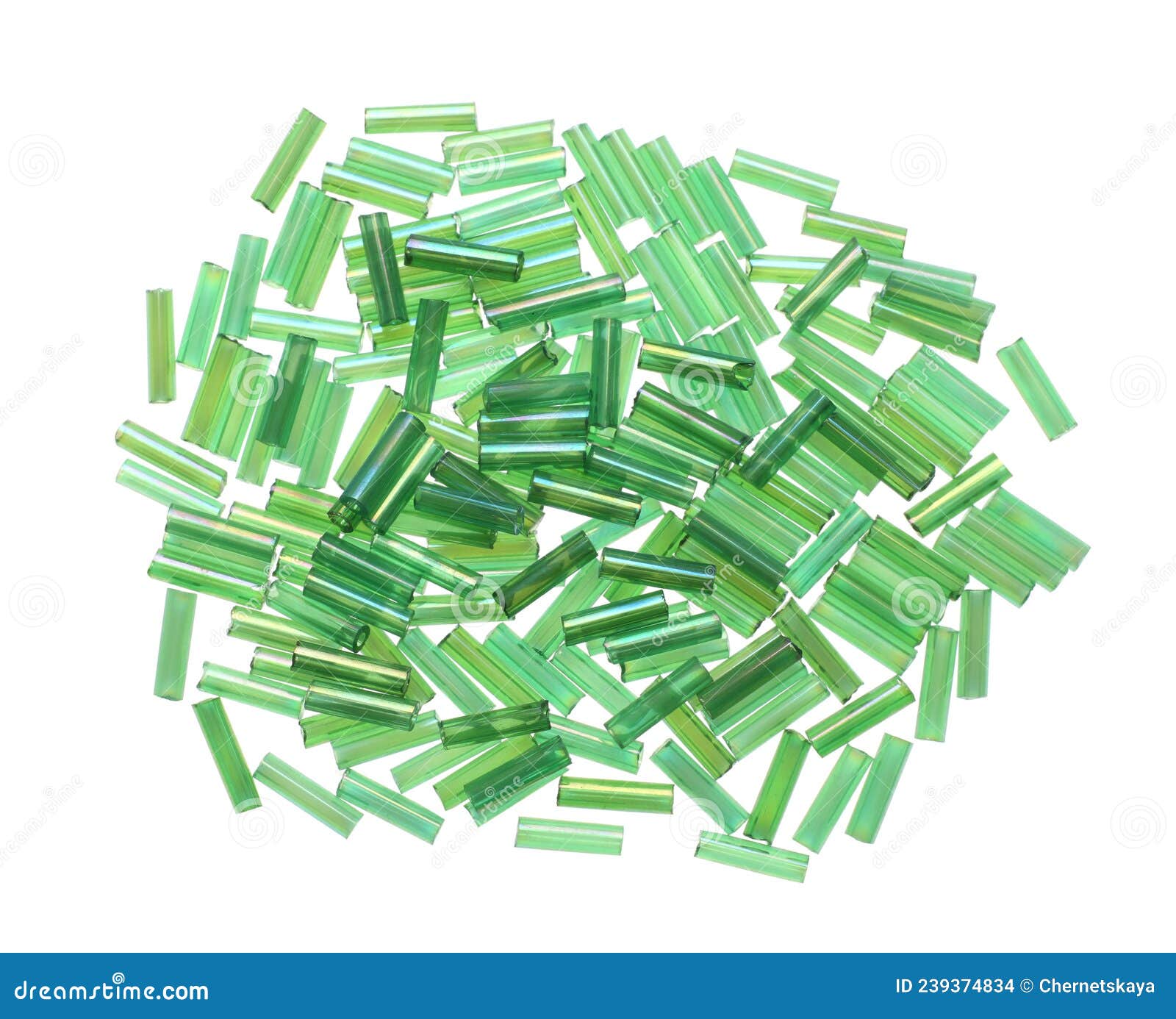 Pile of Green Bugle Beads on White Background, Top View Stock Photo
