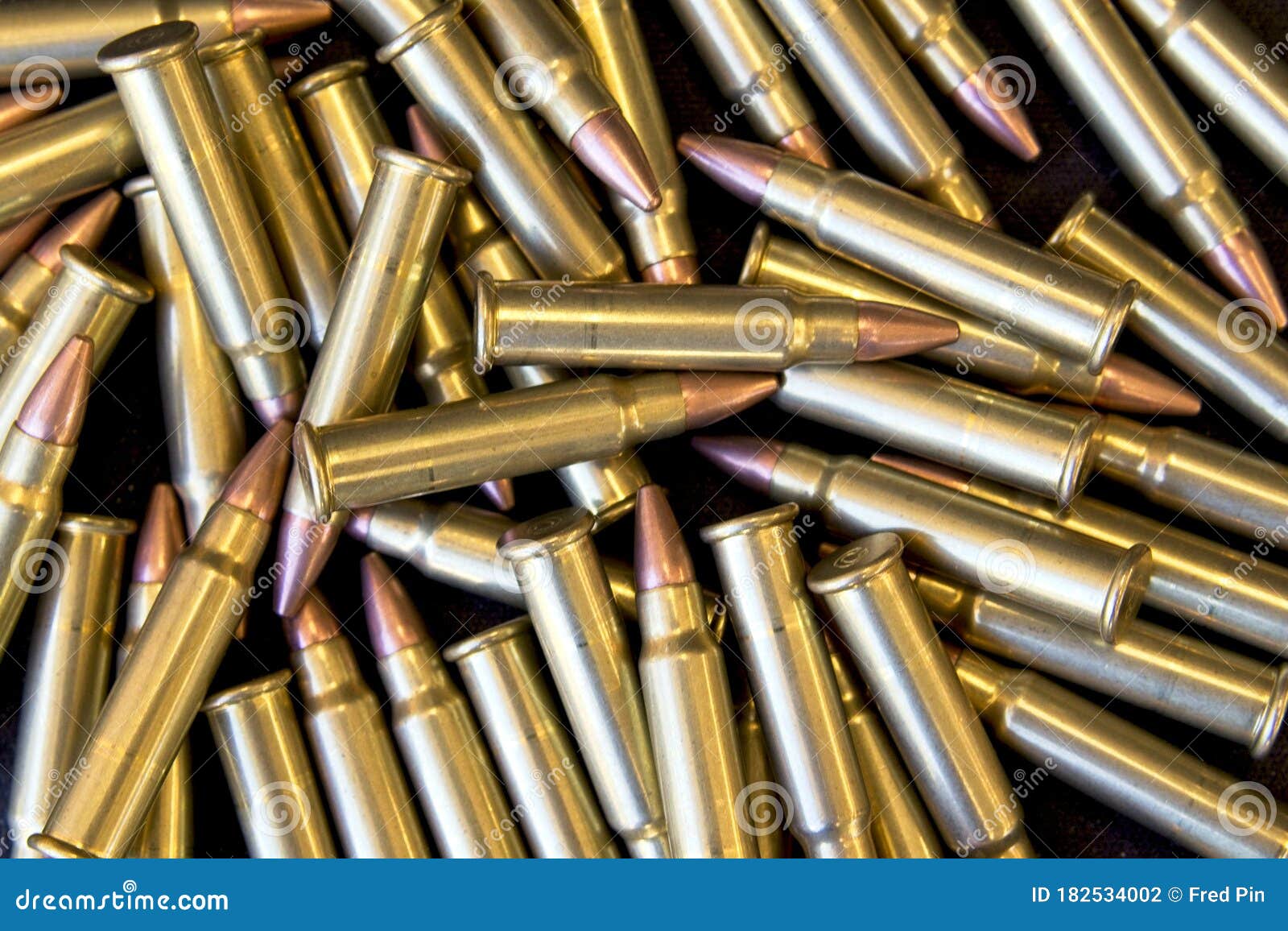 pile of 17hmr hornady rimfire cartridges
