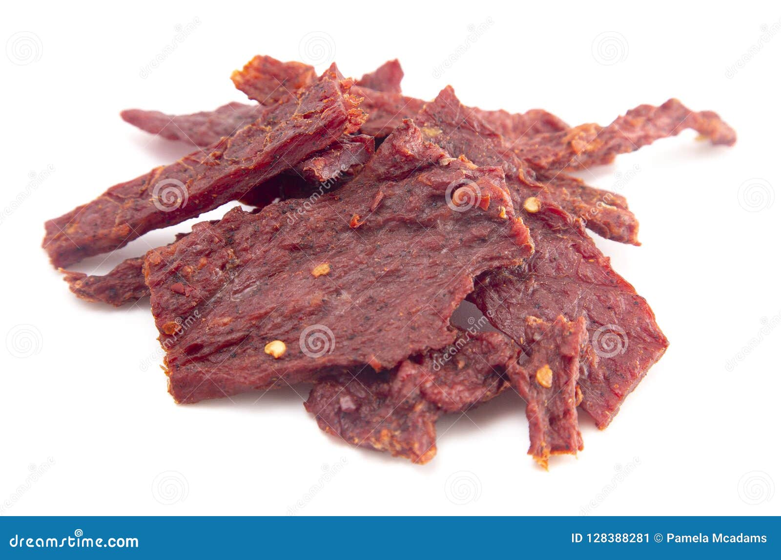 Pile Hot and Spicy Beef Jerky with Red Pepper Flakes Stock Image